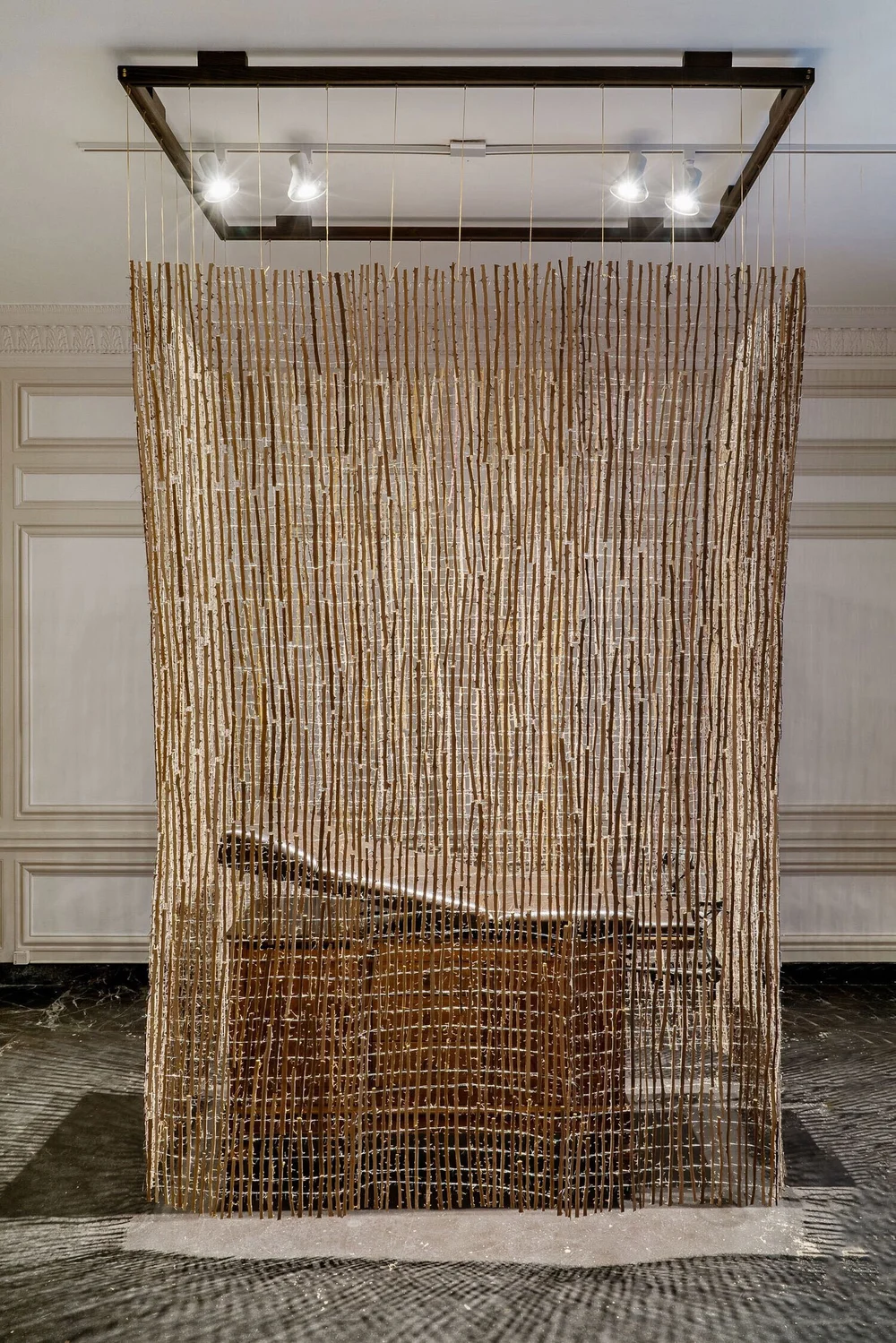 “Hysteria” (2020), thorn branches woven with ligature and Hamilton obstetric table from 1931, 9 x 4 x 6 feet