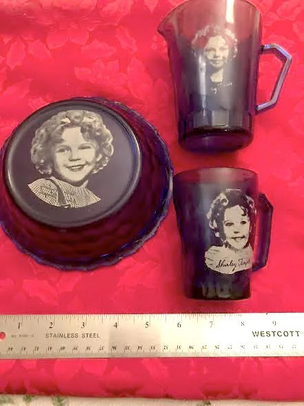 The bowl, mug and milk pitcher were gifts with purchase and mail im premiums