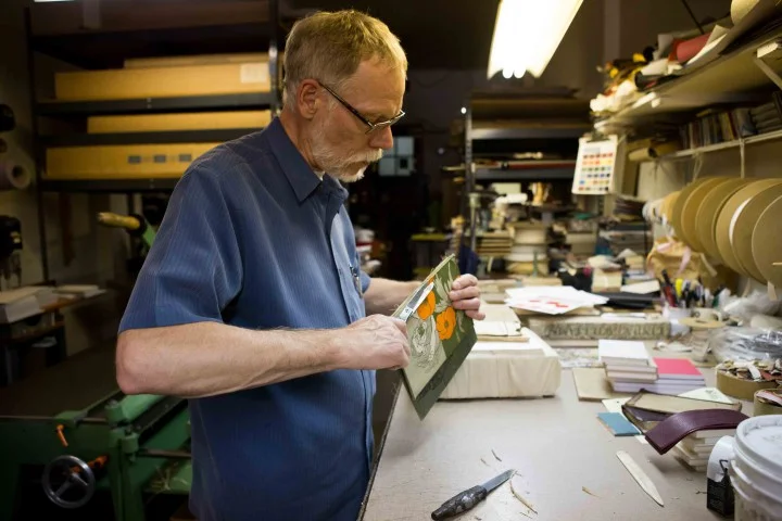 Klaus Rotzcher, owner of Berkeley’s Pettingell Book Bindery
