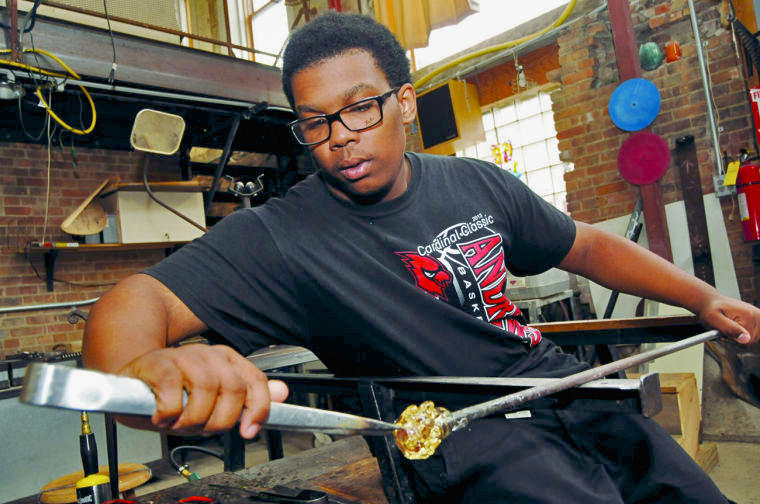 Cornelius started his time at Fired Up doing glassblowing, but moved over to stained glass work: “it allowed me to express my artistic side so much more."