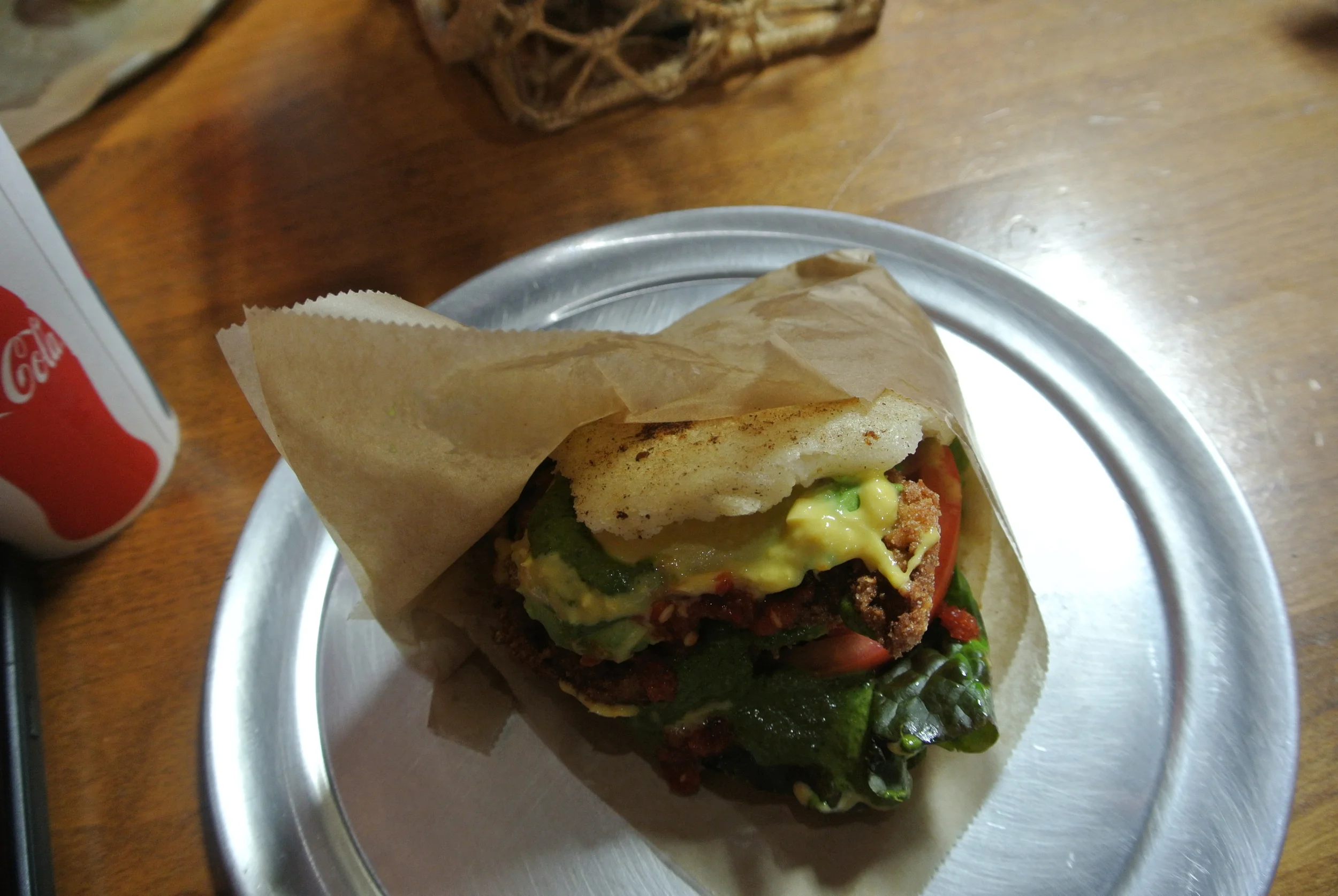 Mi Arepa! Pretty sure this is La Sureña: chicken, lettuce, tomato, avocado, cheese, and cilantro sauce