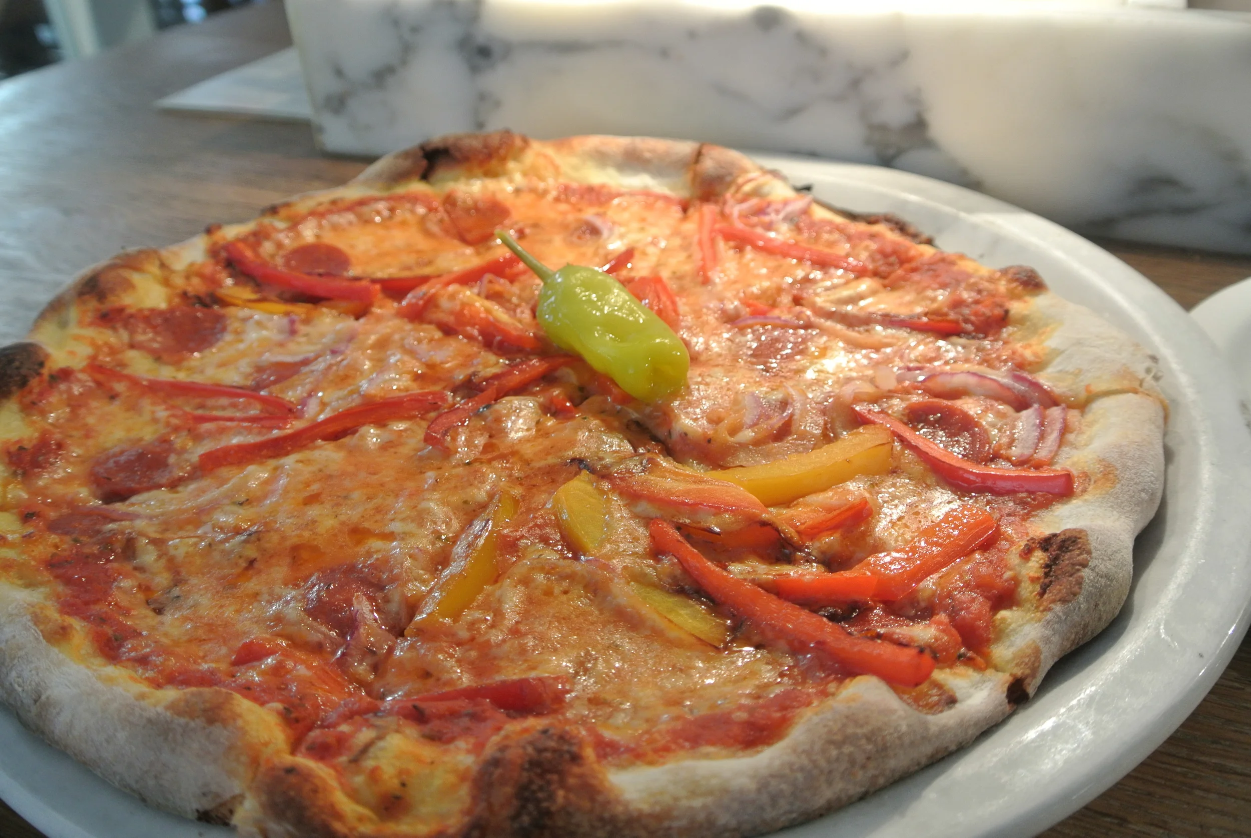 My incredible diavolo: pepperoni, onions, peppers