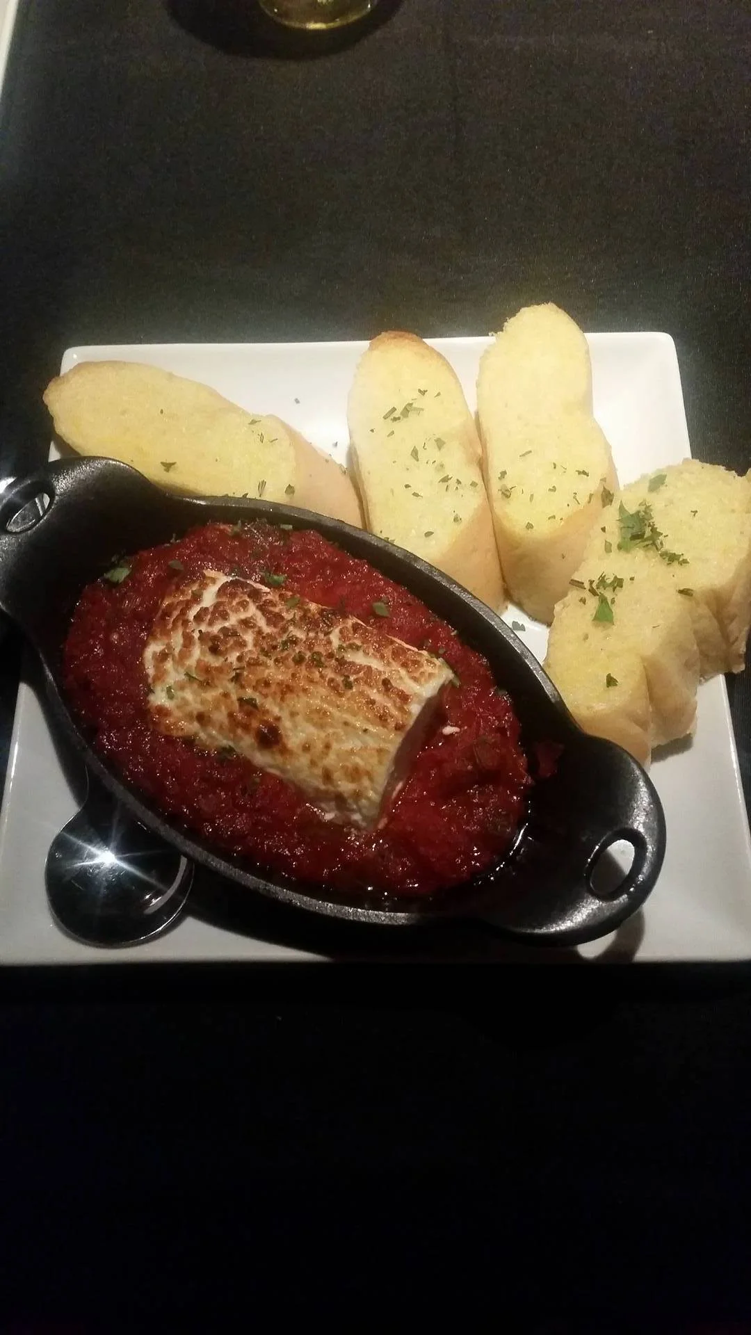 Creole tomato dip with goat cheese. So good. I kept getting bread refills for this one.
