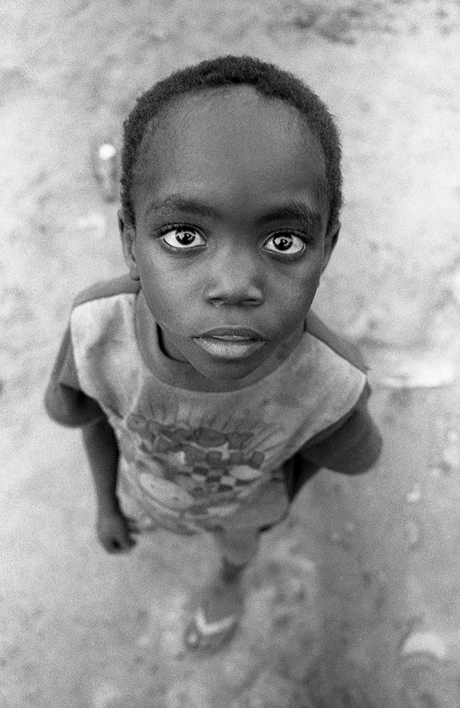 Saurimo | Minolta X700 Minolta MD 28mm F2.8, Ilford HP5+ 400