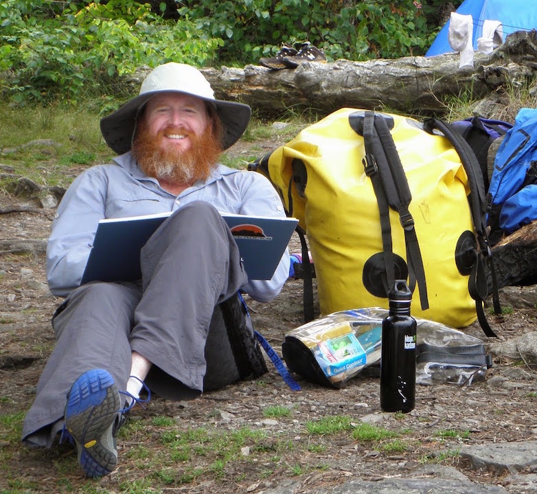 Teague in Minnesota's Boundary Waters Canoe Area, August 2014, at the beginning of his semester sabbatical to write his first draft of Caught Between The Mountain And The Sky.