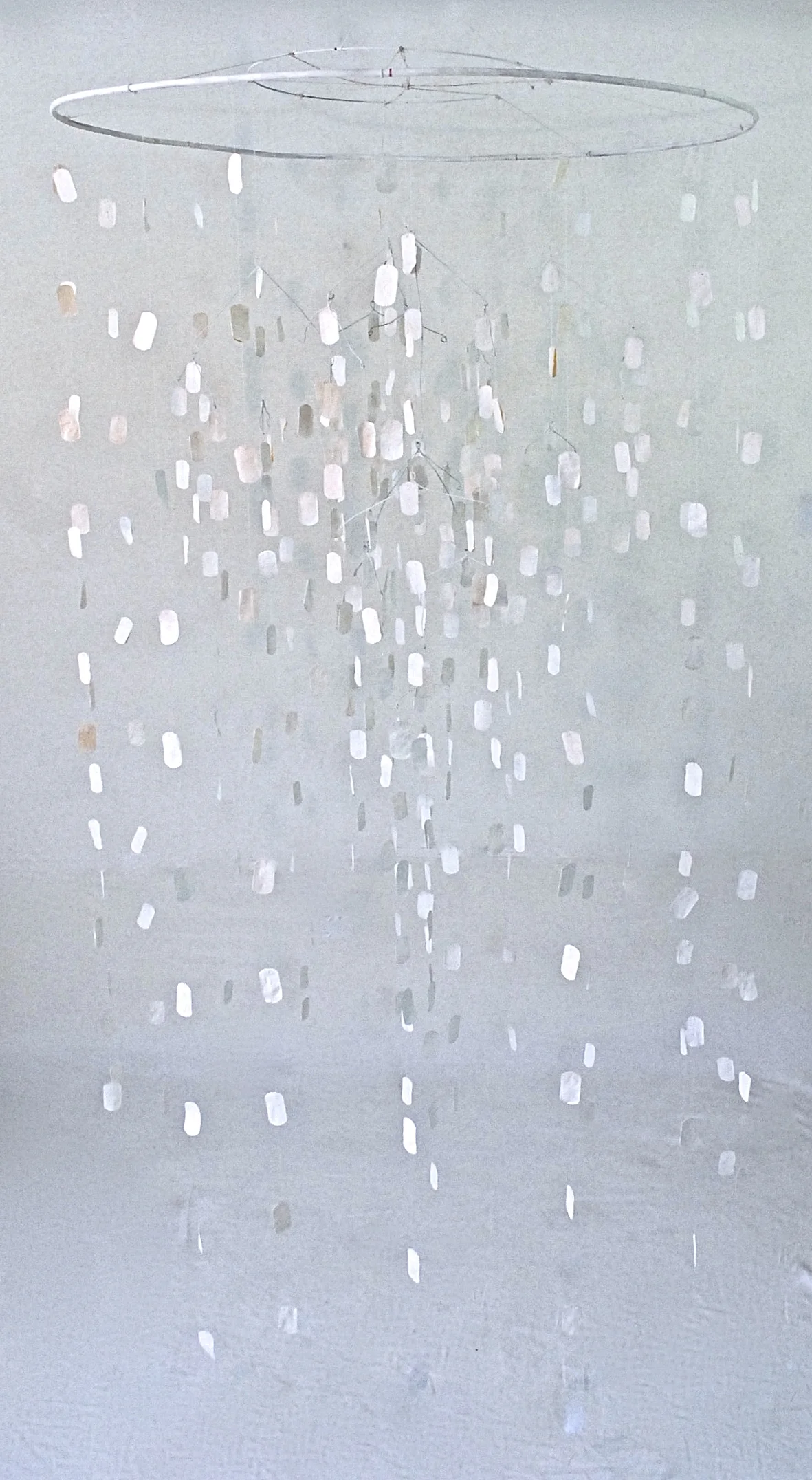 Dogtag Mobile . 367 hollow paper cast dogtags, rabbit-skin glue, thread, white paint, wire. 2013.