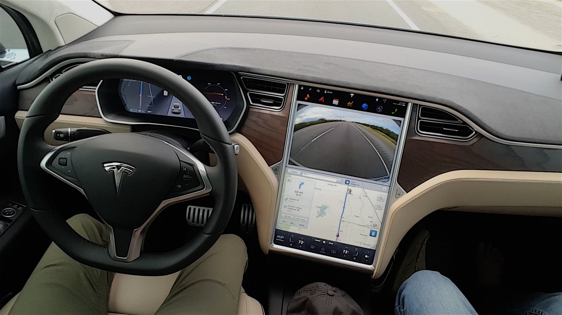 Beth at the wheel. Model X doing the driving. ** see footnote