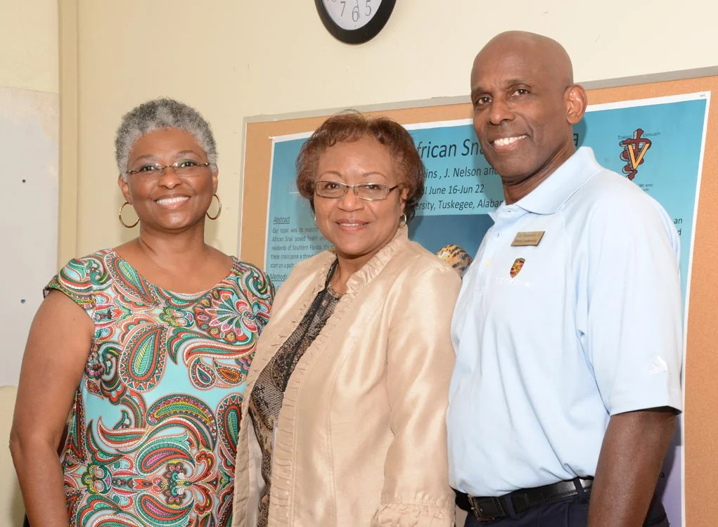Carl, Dean Perry, and his wife, Jacqueline