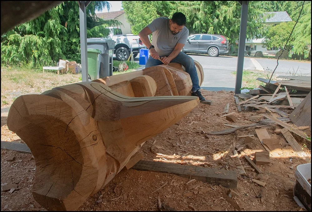 A new pole takes shape in the carving shed at Bear Horne's parents' home. This private commission will be raised on Goat Island in the fall of 2025
