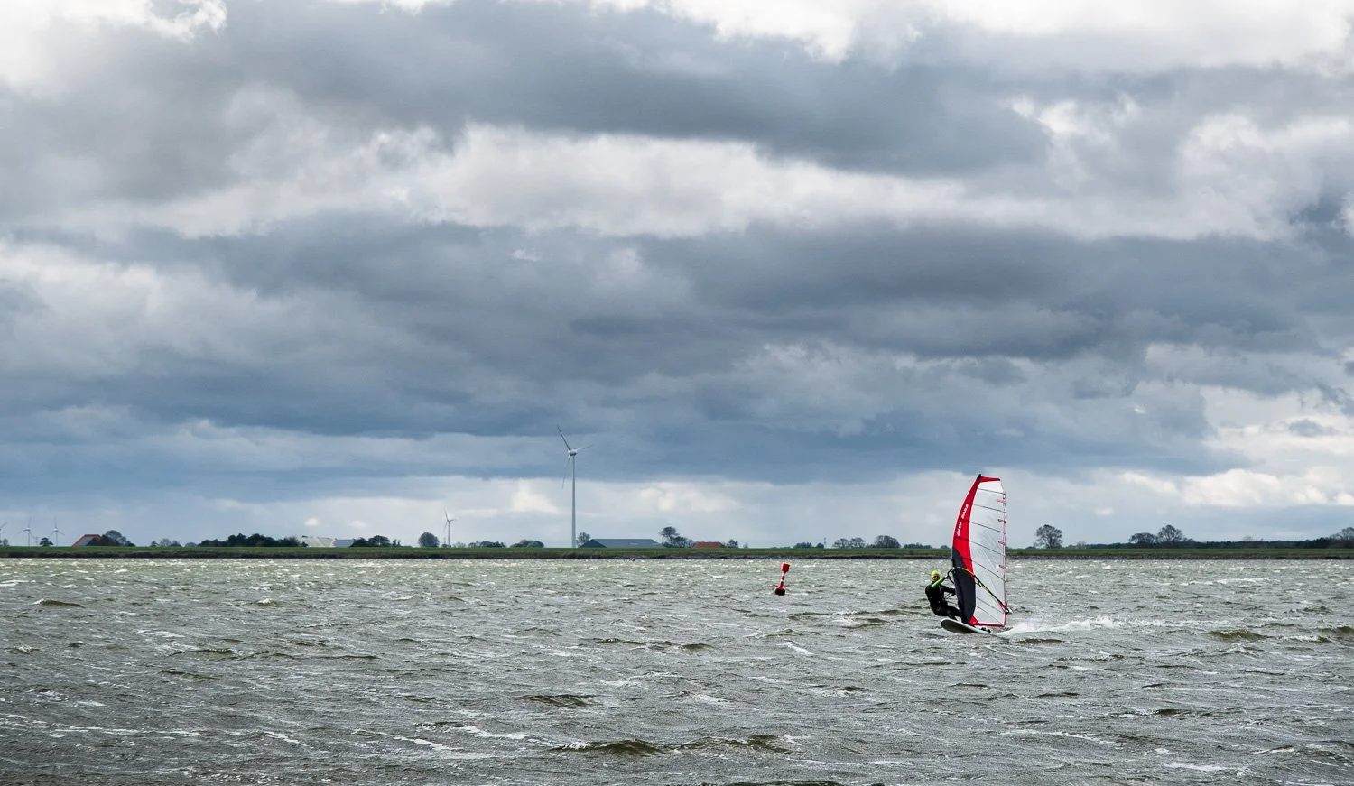 Windsurfen op het Amstelmeer vanaf het Lutjestrand