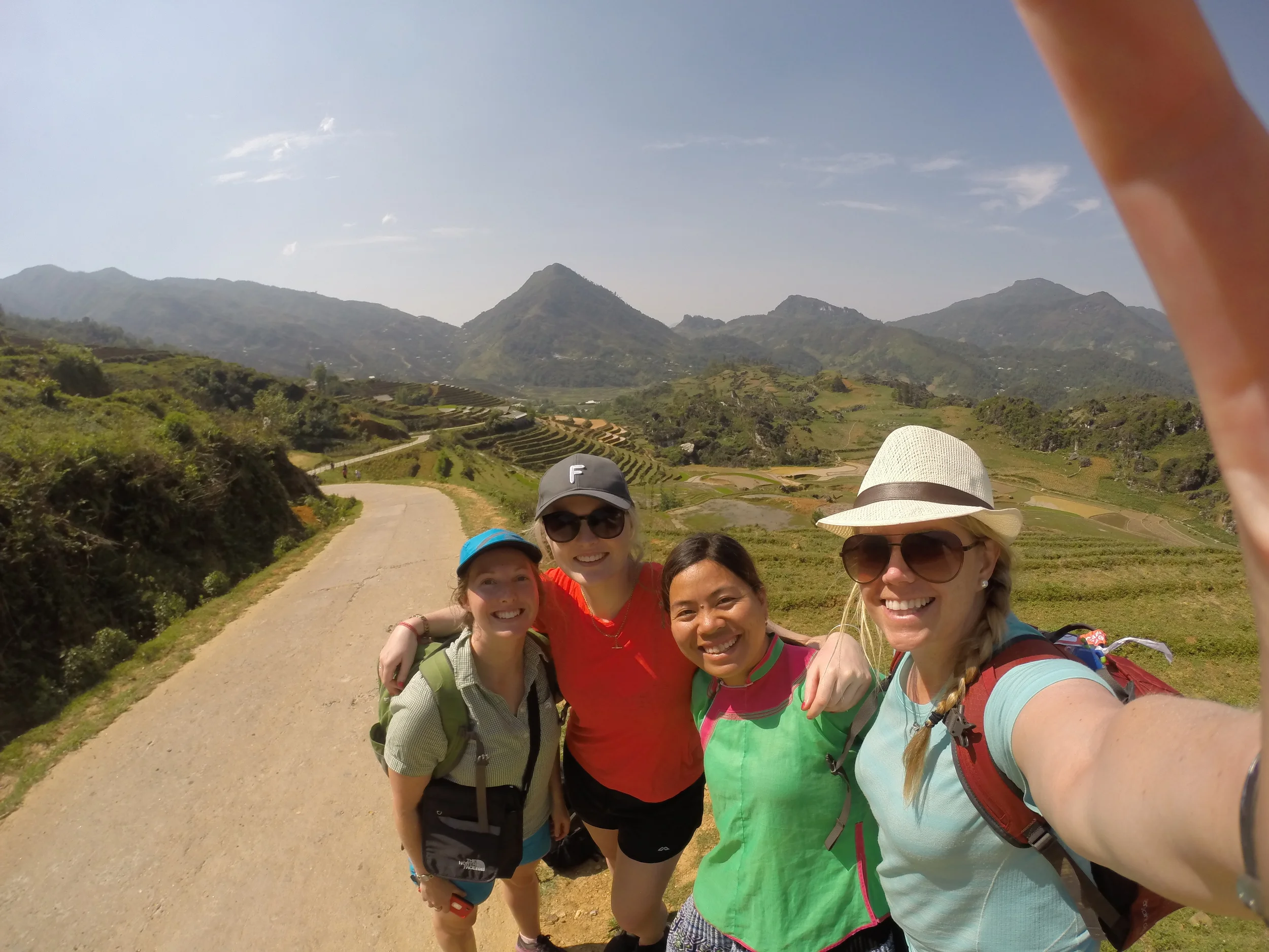 Me, Pham, and two awesome Kiwis, Nina and Tessa trekking through the rice fields.