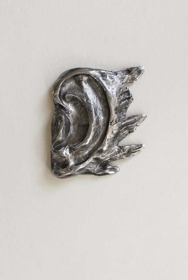   The Secret Holder     Aluminium    15 x 13 x 2 cm 