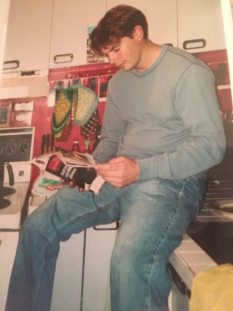 Jeff catching up on world politics in his kitchen during his time at McGill Law.