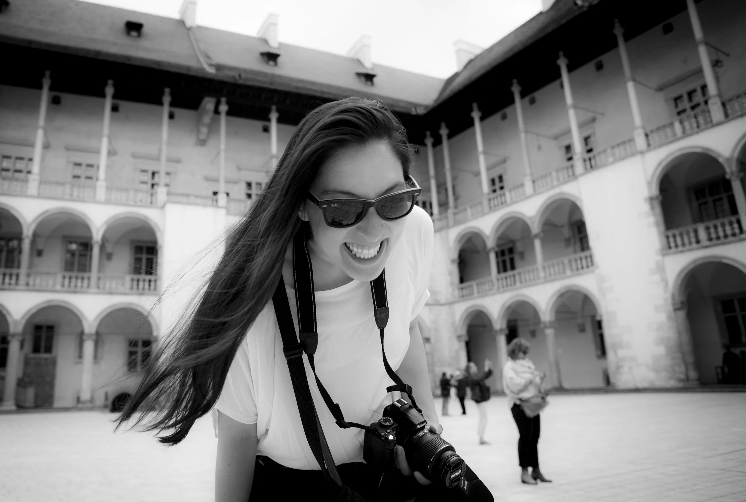 Stephanie with her camera while travelling in Krakow, Poland.