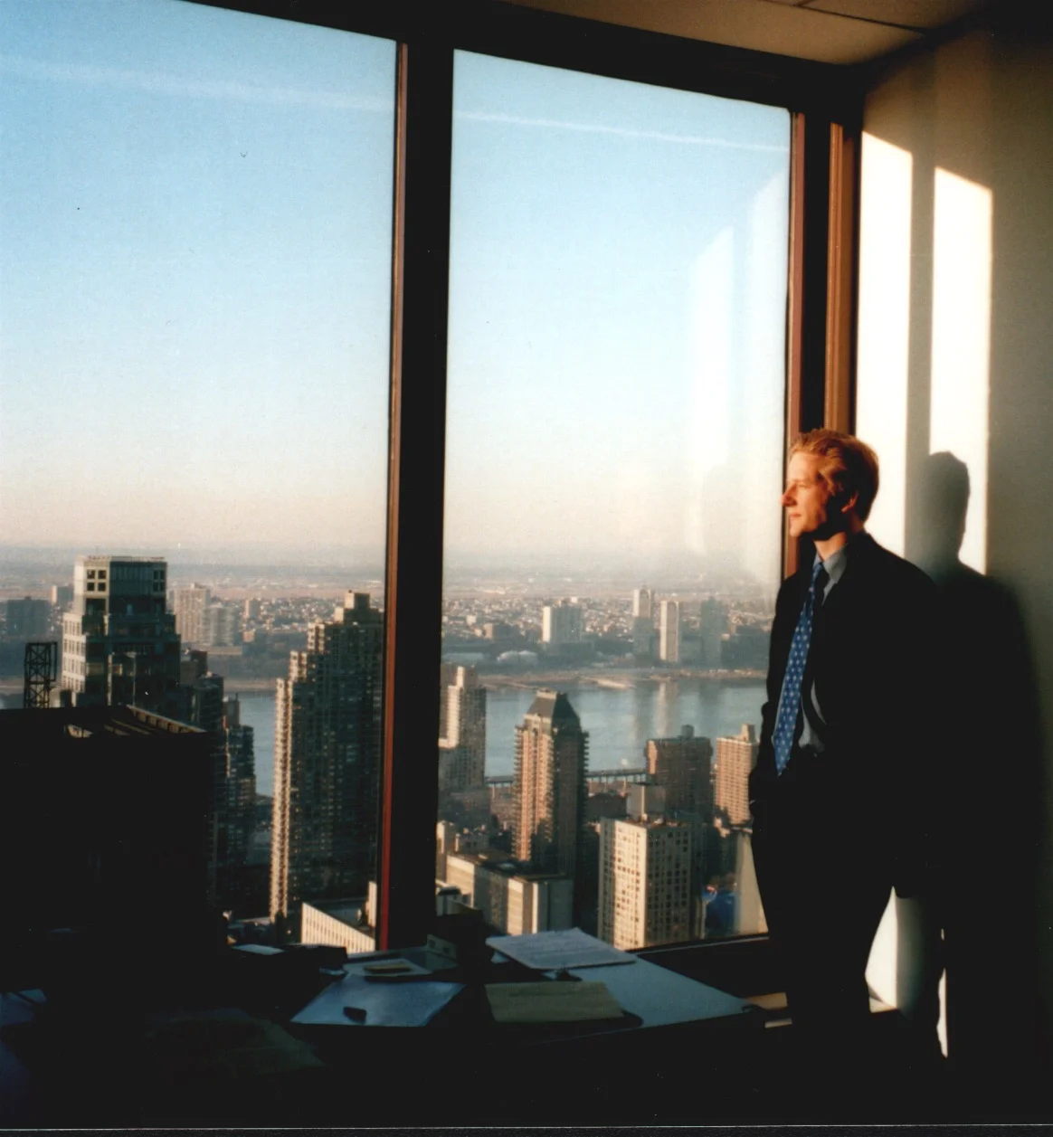 Close to my desk – taken in Manhattan, Carnegie Hall Tower, interning for a large firm, a long long time ago. There were no smart phones, not even digital cameras; one of my fellow interns must have brought a camera for some reason and caught me staring into the sunset instead of at my files.