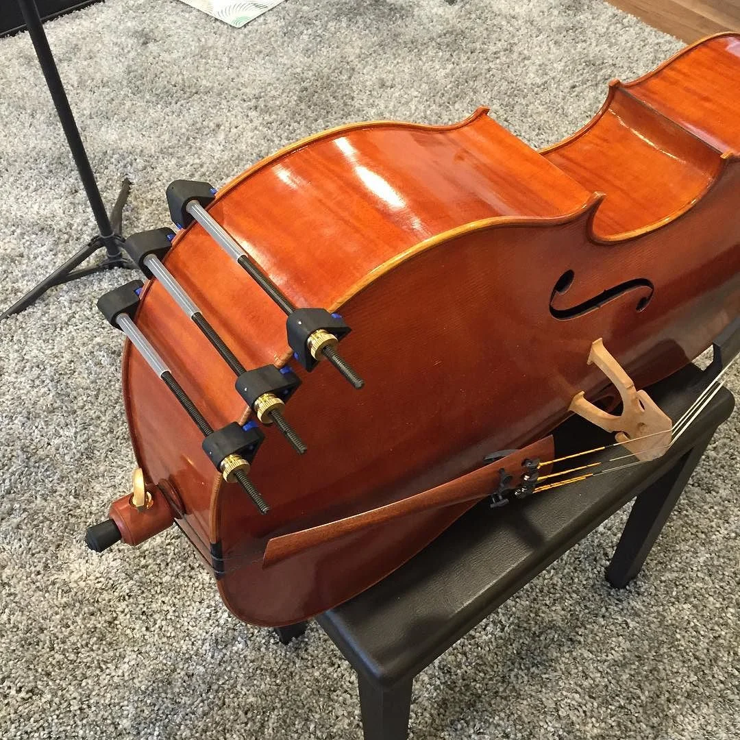A quick little seam repair on my cello this morning. It opened up the other night while I was teaching with a sudden “crack” sound!
#hothideglue #cello #repair #luthier #kelvinscott #herdim #clamps #quickfix #hideglue http://ift.tt/1PHbuPw