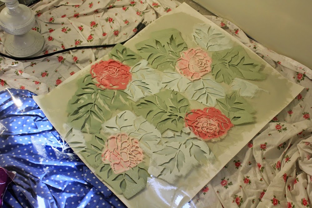 Very quickly I began to get mixed-up when I tried to match the peony pattern on the wall. If you are stenciling with multiple colors, make a template on an old piece or cardboard or poster board so that you can refer to it during the process.