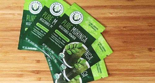 moringa-powder-packets-background-portrait-a226c75e2829733e3ad9e427623d213a.jpg