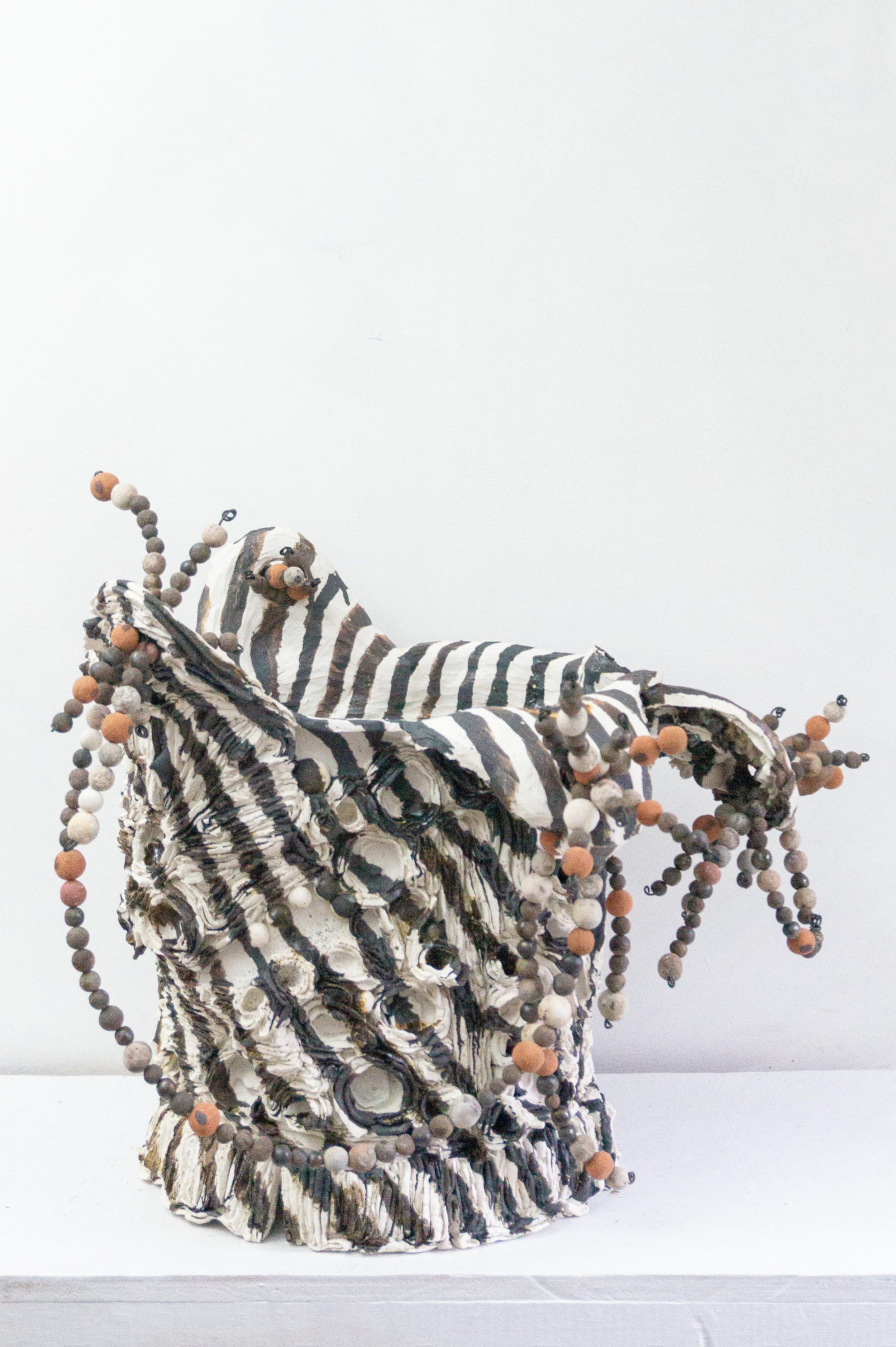  Bucket (Jester), 2022, porcelain, Bay of Fundy sand,&nbsp;Black Walnut ash, oxides, selection of woodfired beads saved through the years, wire, 27” x 23” x 18”, SOLD 