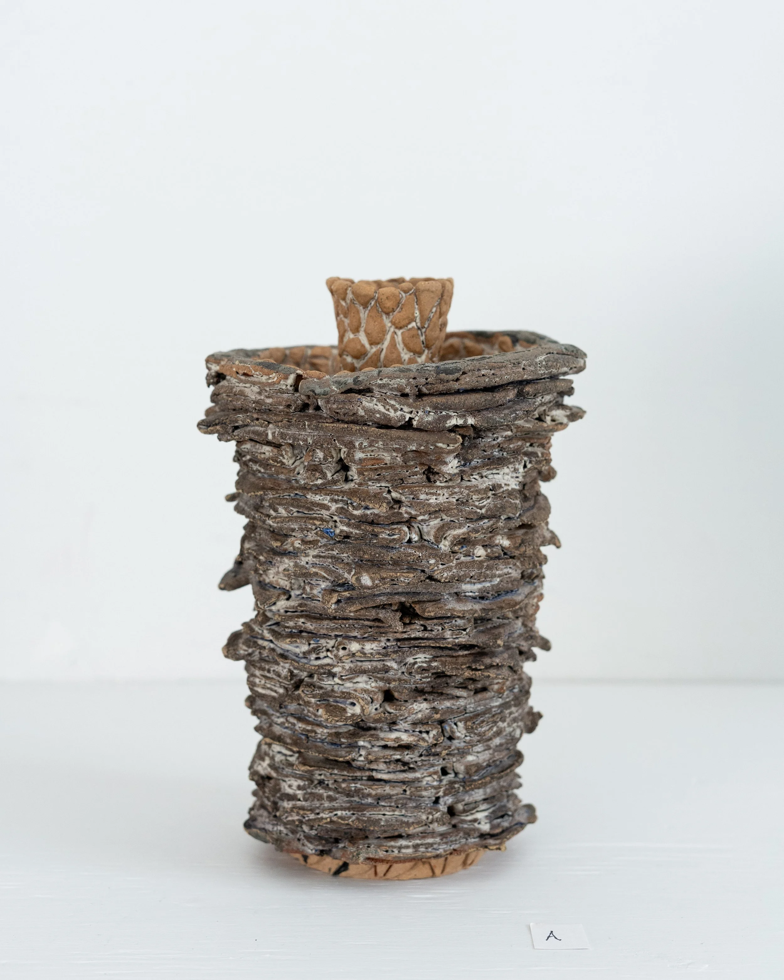   Pillar,  2025, stoneware, sand, oxides, ash glaze, LWH 5”x5”x7.5” 