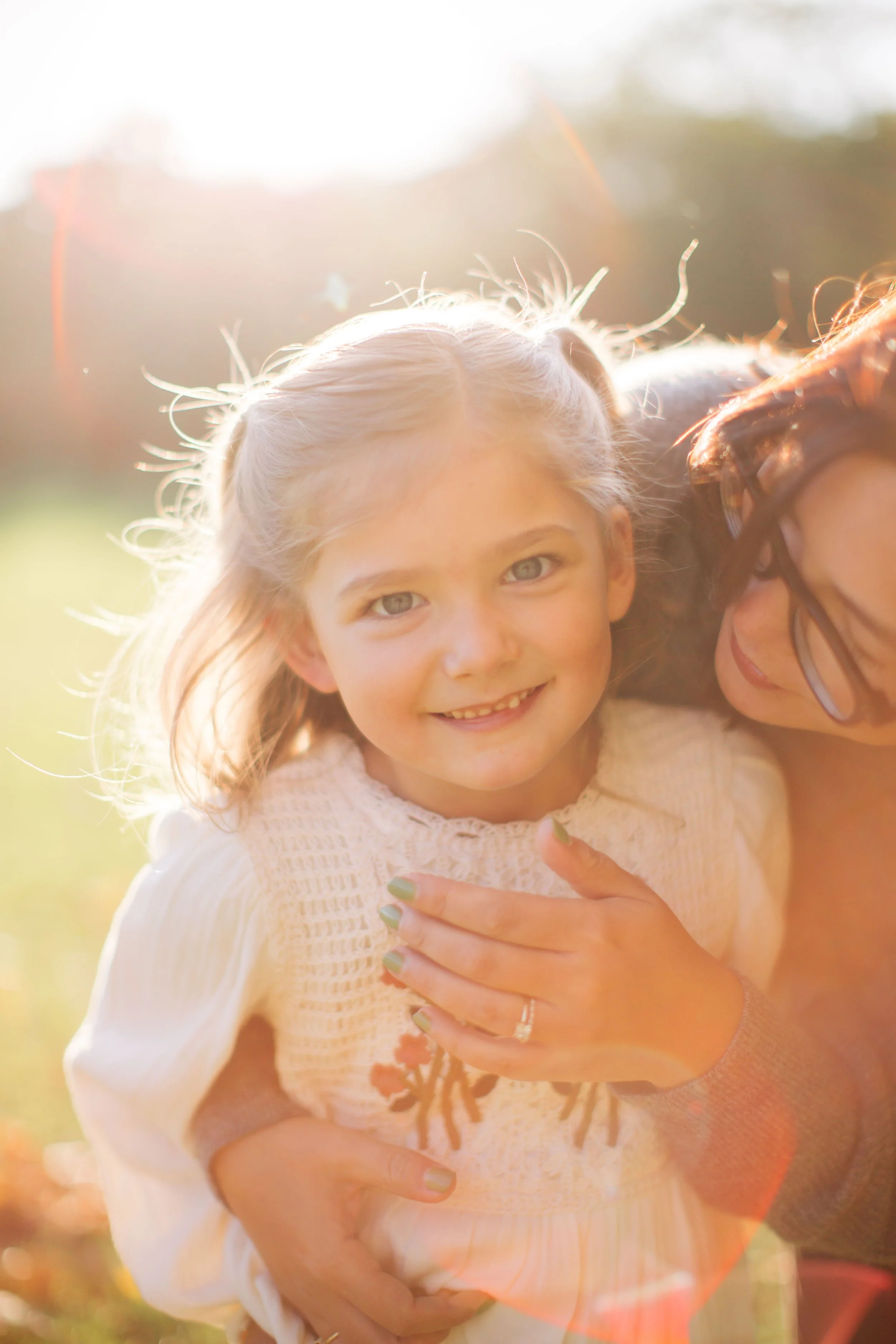 Hannah Persson Photo | Family Session | Portrait of a little girl smiling.jpg