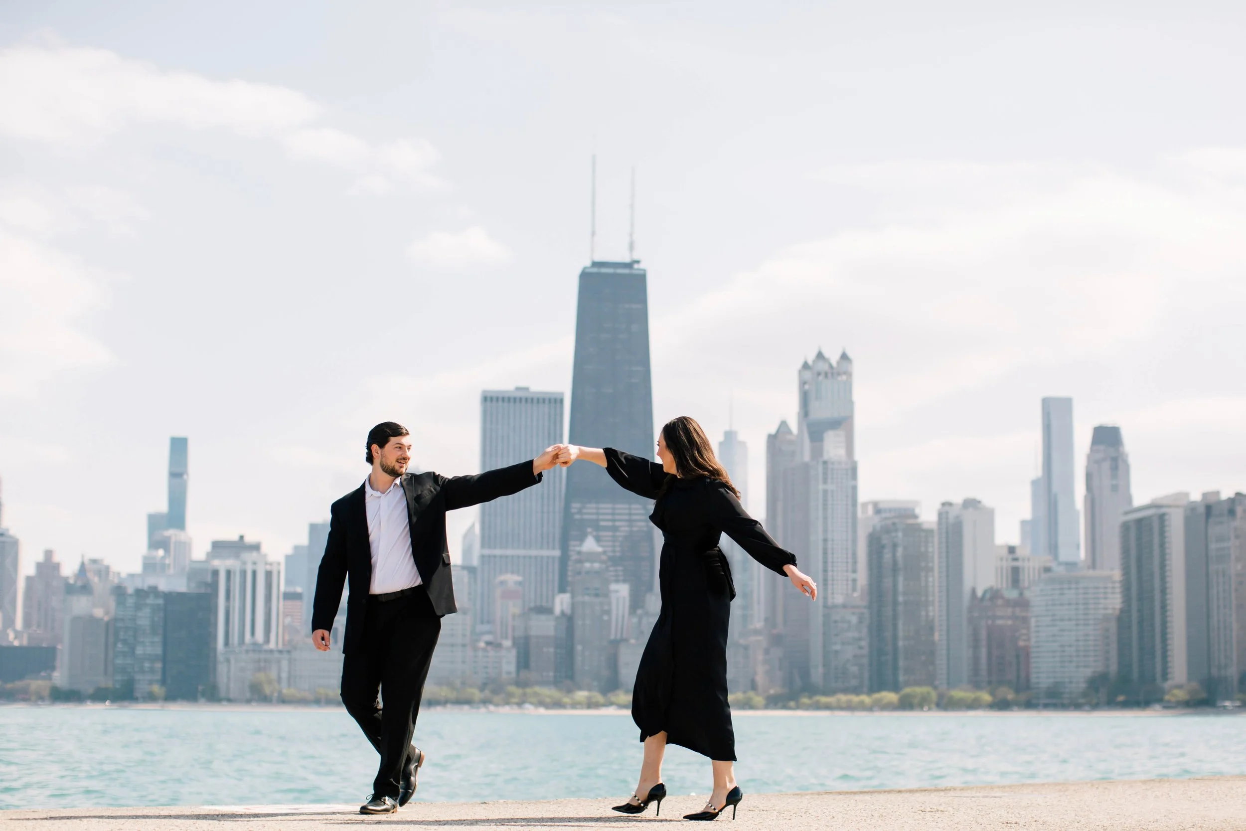 Hannah Persson Photo | Best locations in Chicago | Couple dancing on lakefront trail.jpg