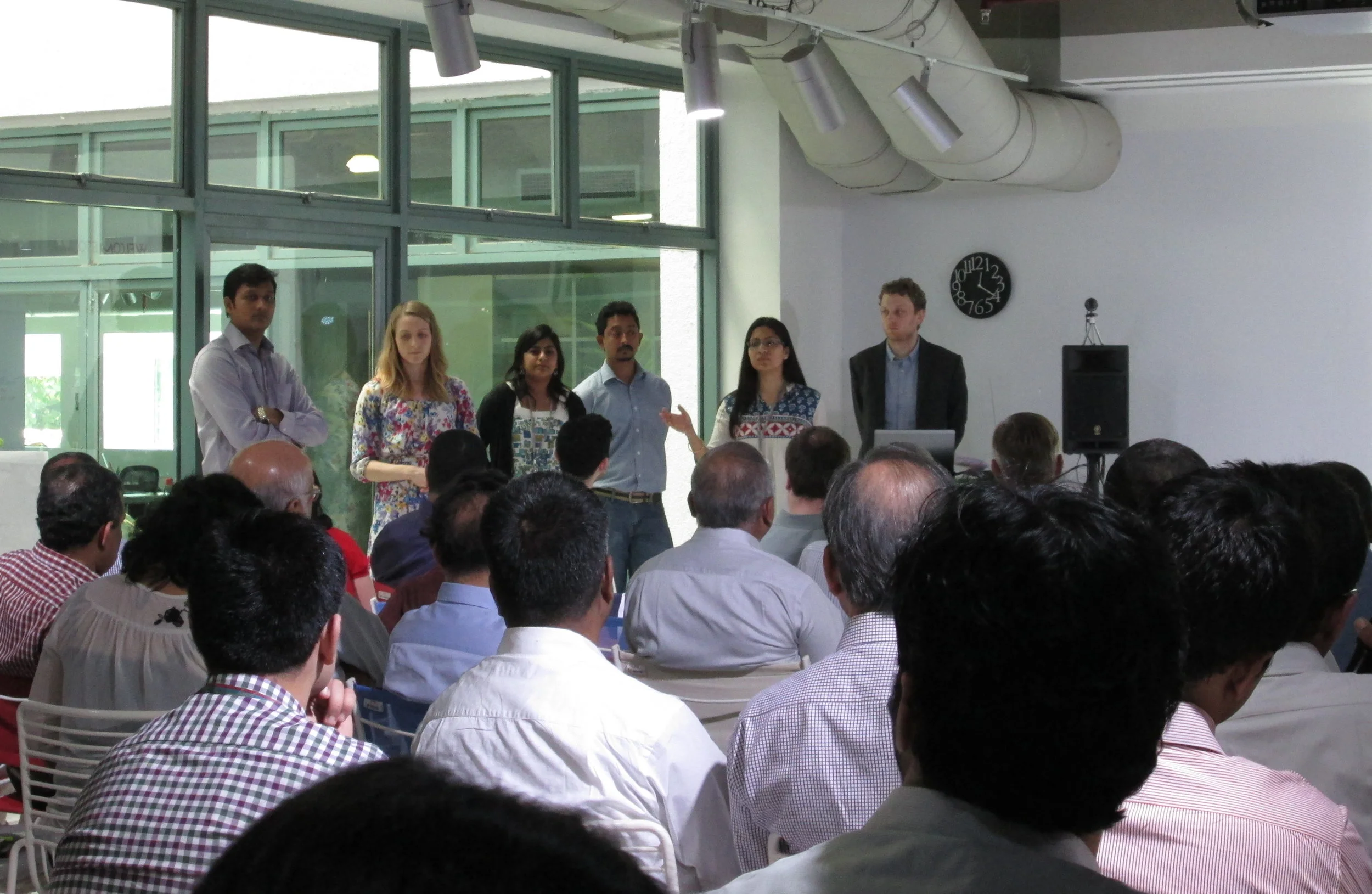 Answering questions at the final presentation. Photo courtesy of client.