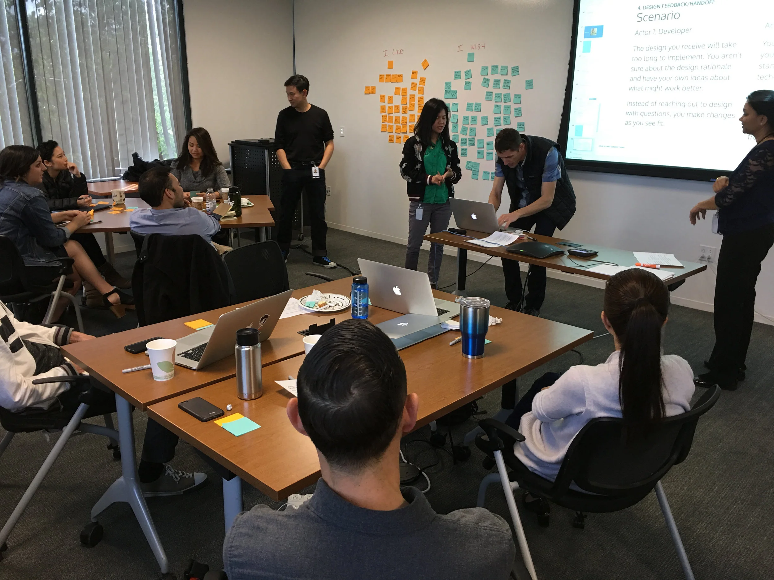 IMAGE: UX staff roleplaying a common scenario from our research, bringing to life existing pain points.