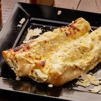 CANNELLONI We have Two different types of Cannelloni 1. CHICKEN AND MUSHROOM 1. SPINACH AND RICOTTA
