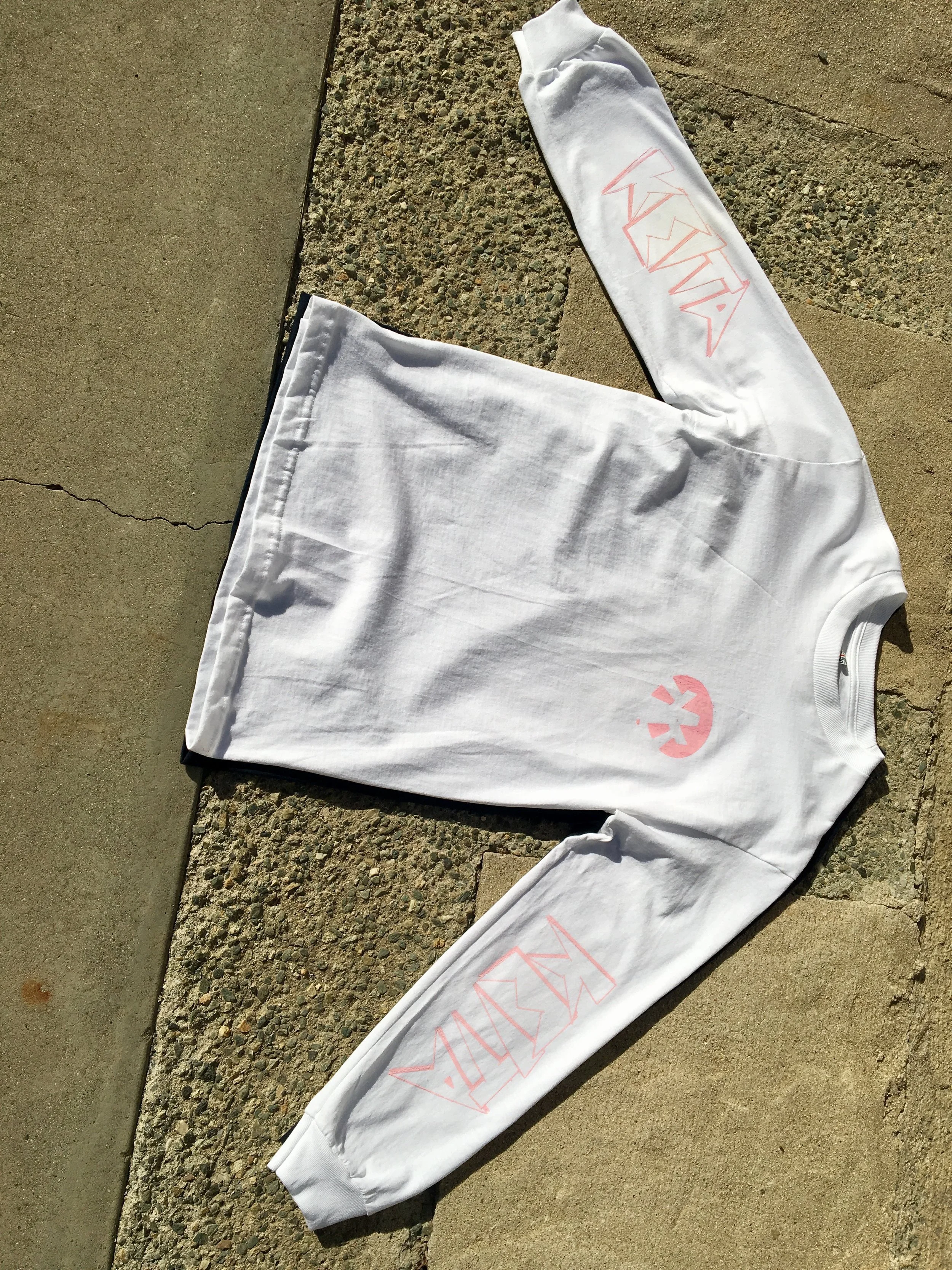 White w/ pink... Regular $40... Holiday $20...