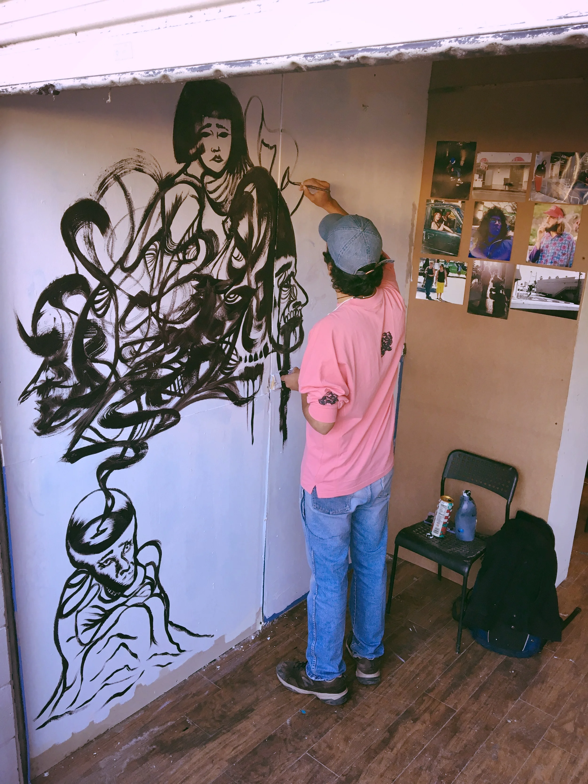 flowing at the KEITA warehouse / studio for art show 1.2017 the BEFORE pic photographs on wall by Corey V.