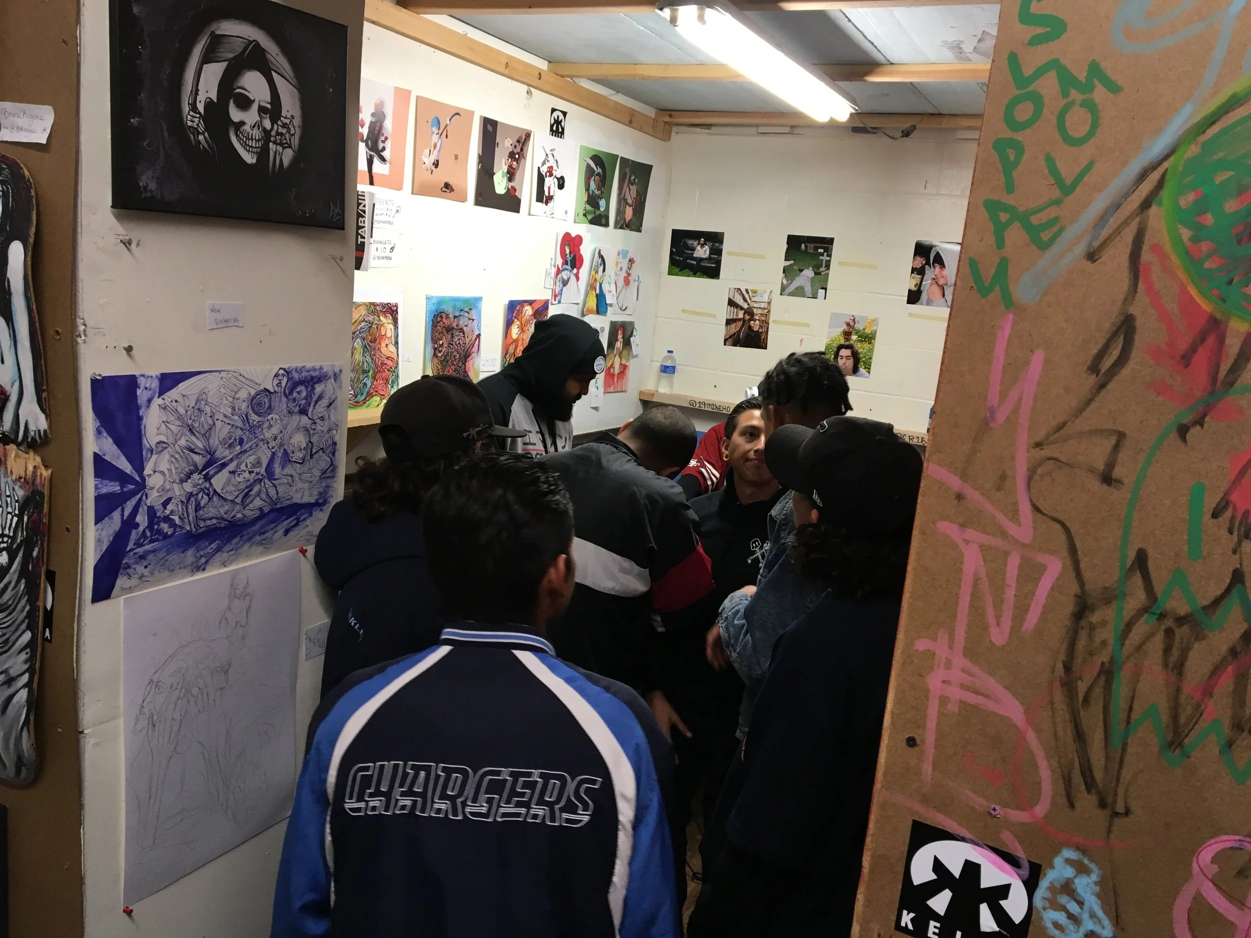 Tratyn of Tab92 showing. Gabe of EMANON representing Oceanside artists.