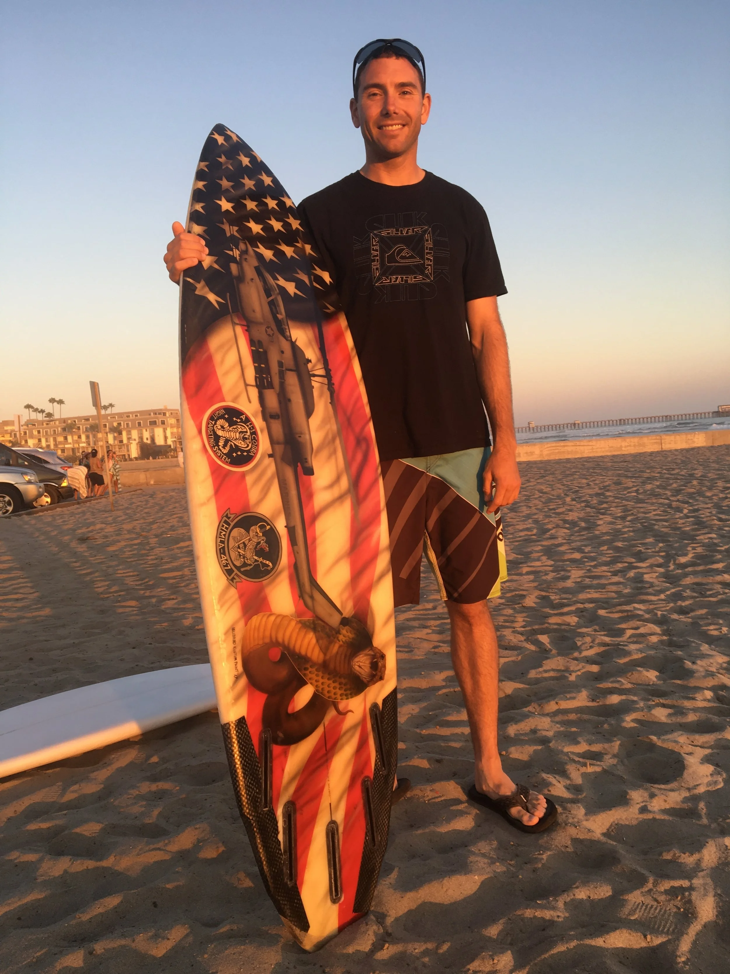 Chris Smith's 5'10 cobra model surfboards by Raoul Kischina art by HELLBOUND KUSTOM PAINT. Support the Troops! Top pic show board. Bottom pic go to board. 