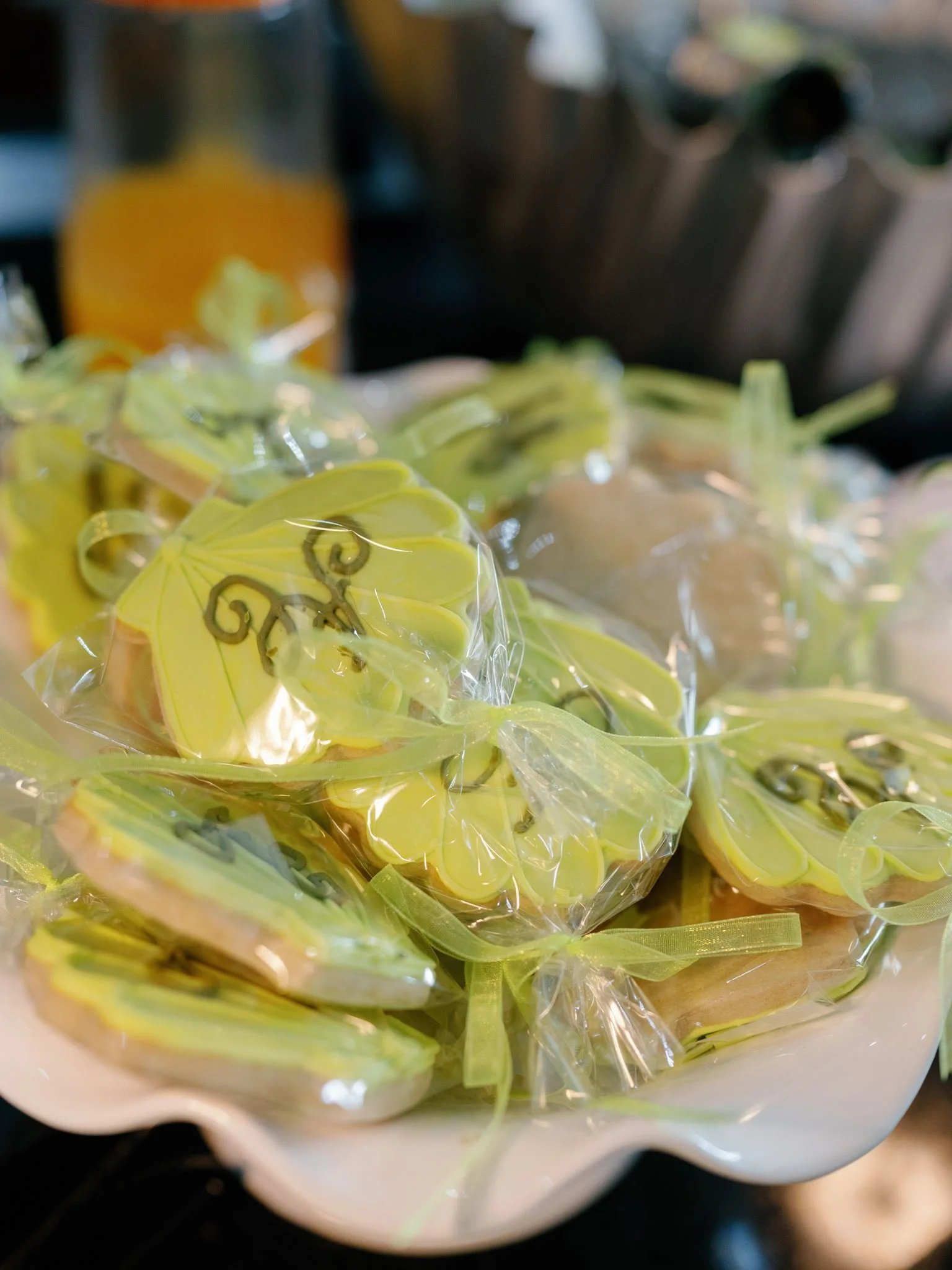Yellow decorative star-shaped soaps wrapped in clear plastic with black decorative writing.