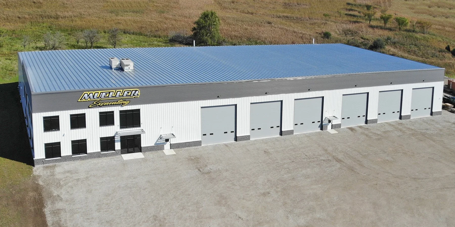 Single slope pre-engineered maintenance building by Redhawk Metal Buildings in Wisconsin