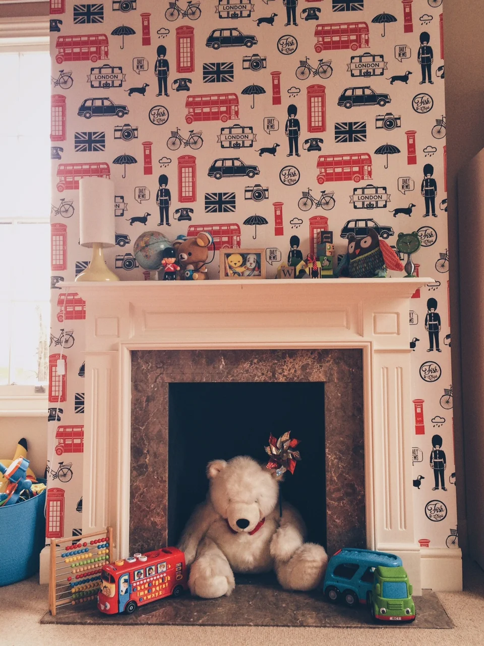 This wallpaper is 'London Red' by Graham & Brown - a total bargain at £10 a roll!