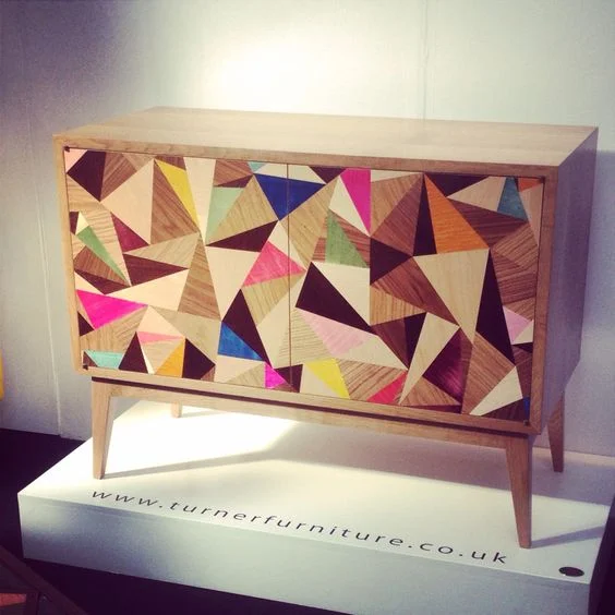 This piece is by UK furniture makers Turner Furniture .