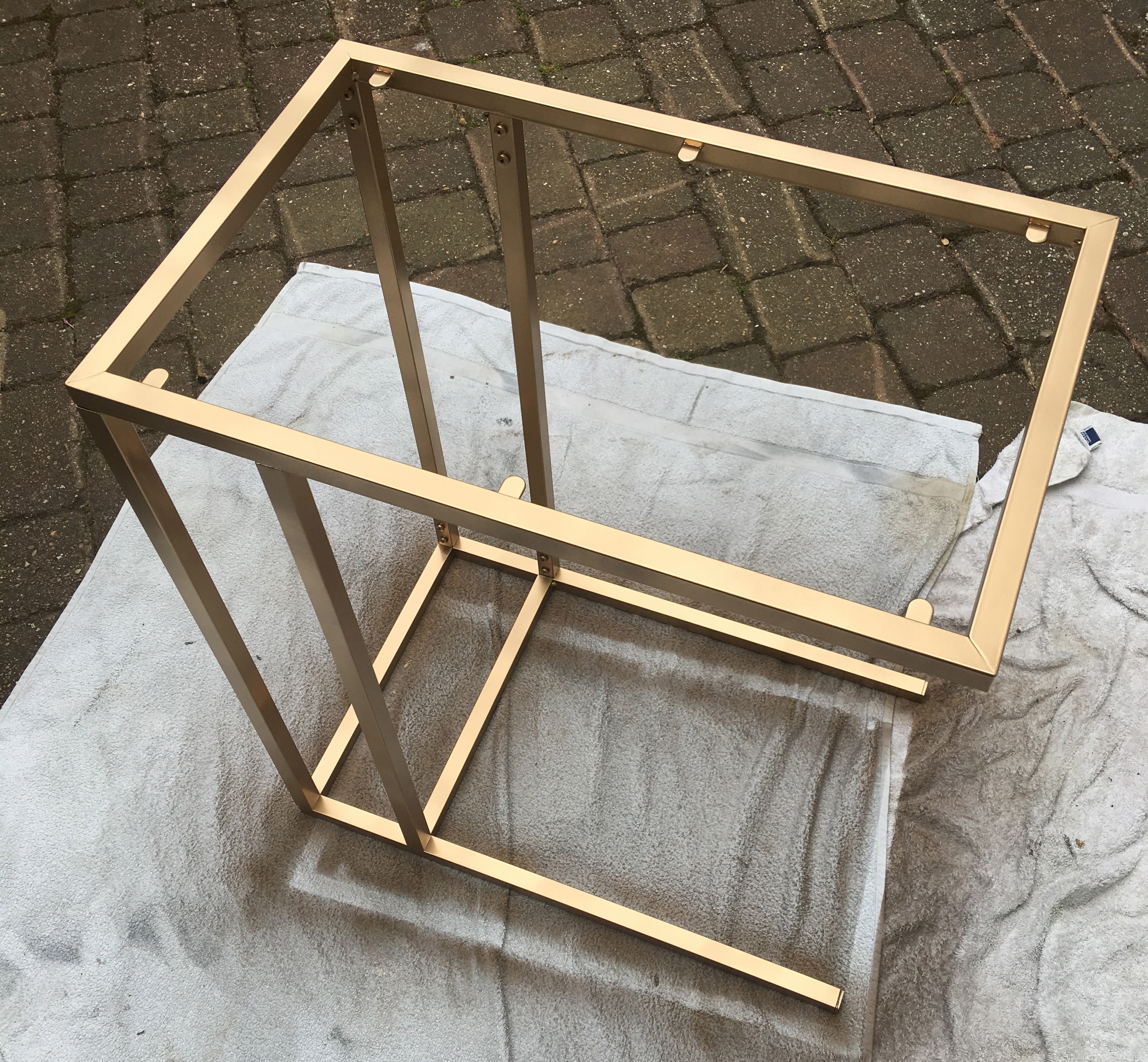 Ikea VITTSJO table spray painted in PlastiKote 'brilliant metallic'.