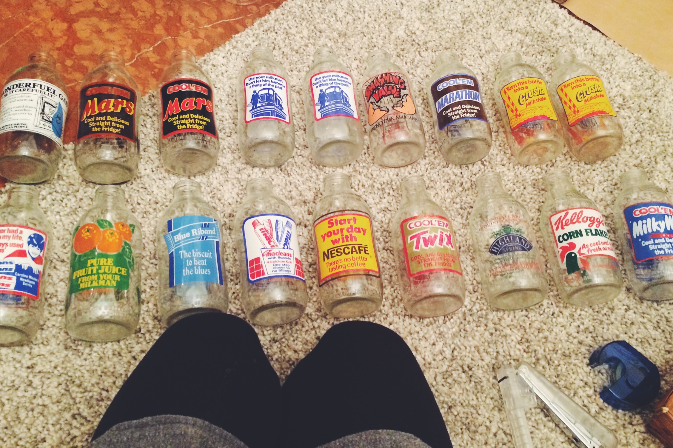 An Ebay haul of retro milk bottles with the old adverts for Twix, Corn flakes and Nescafe among others.