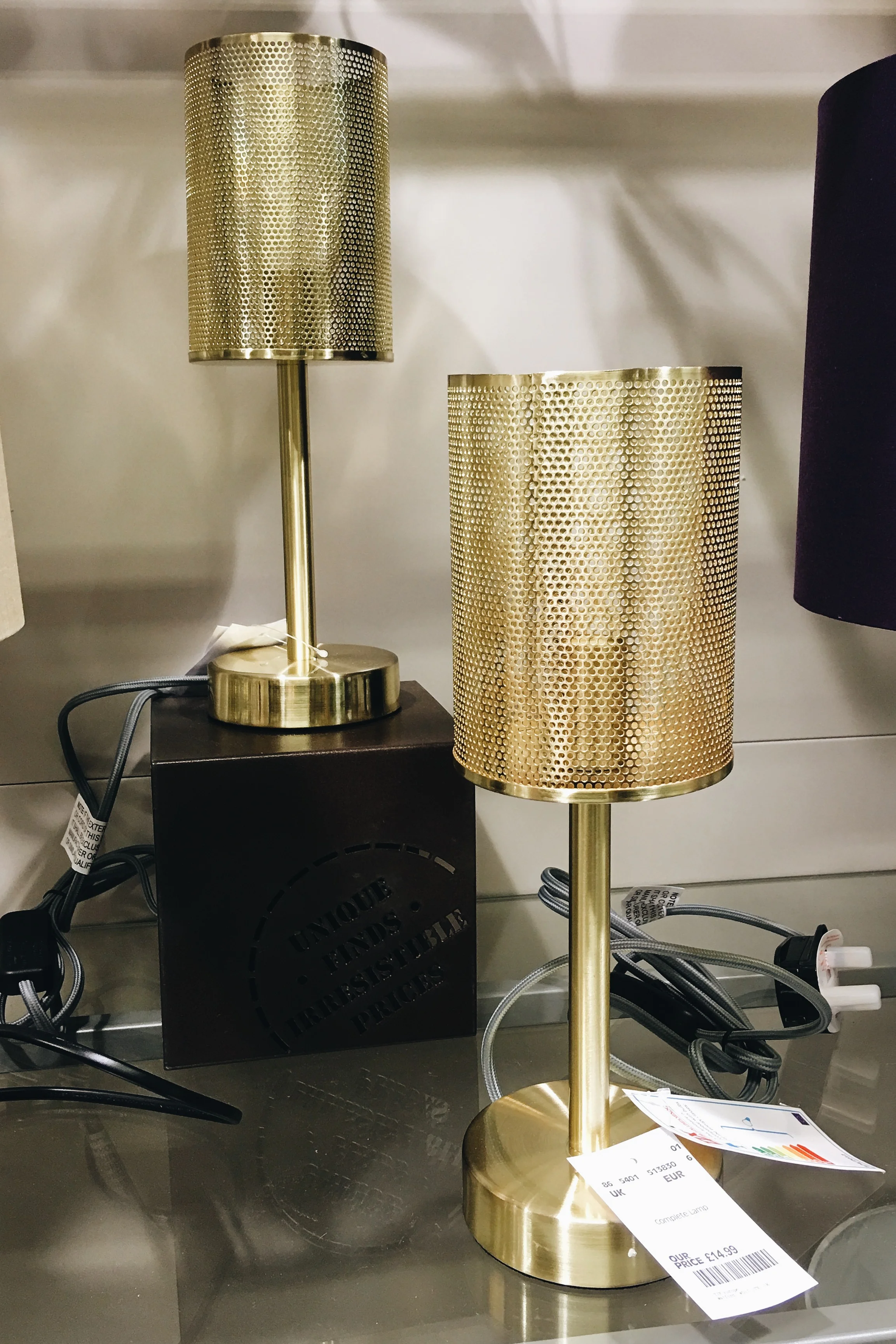 These gold lights are only £14.99 each. I'd buy two and have them as bedside table lamps - that's bedroom lighting sorted for just shy of only £30!