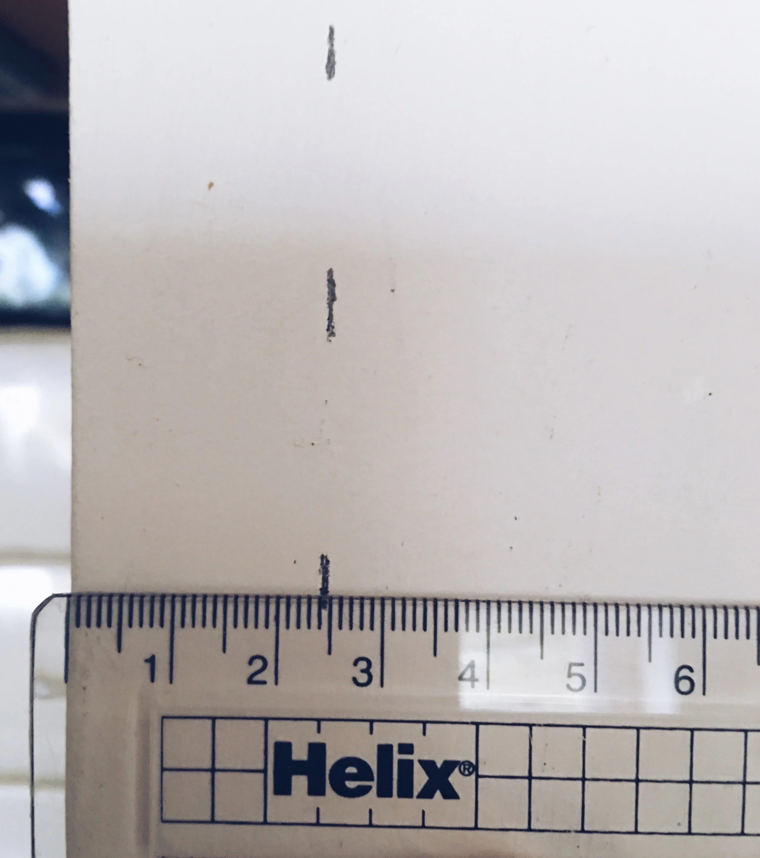 Using a ruler, mark out in pencil a guide line for your Frog Tape .