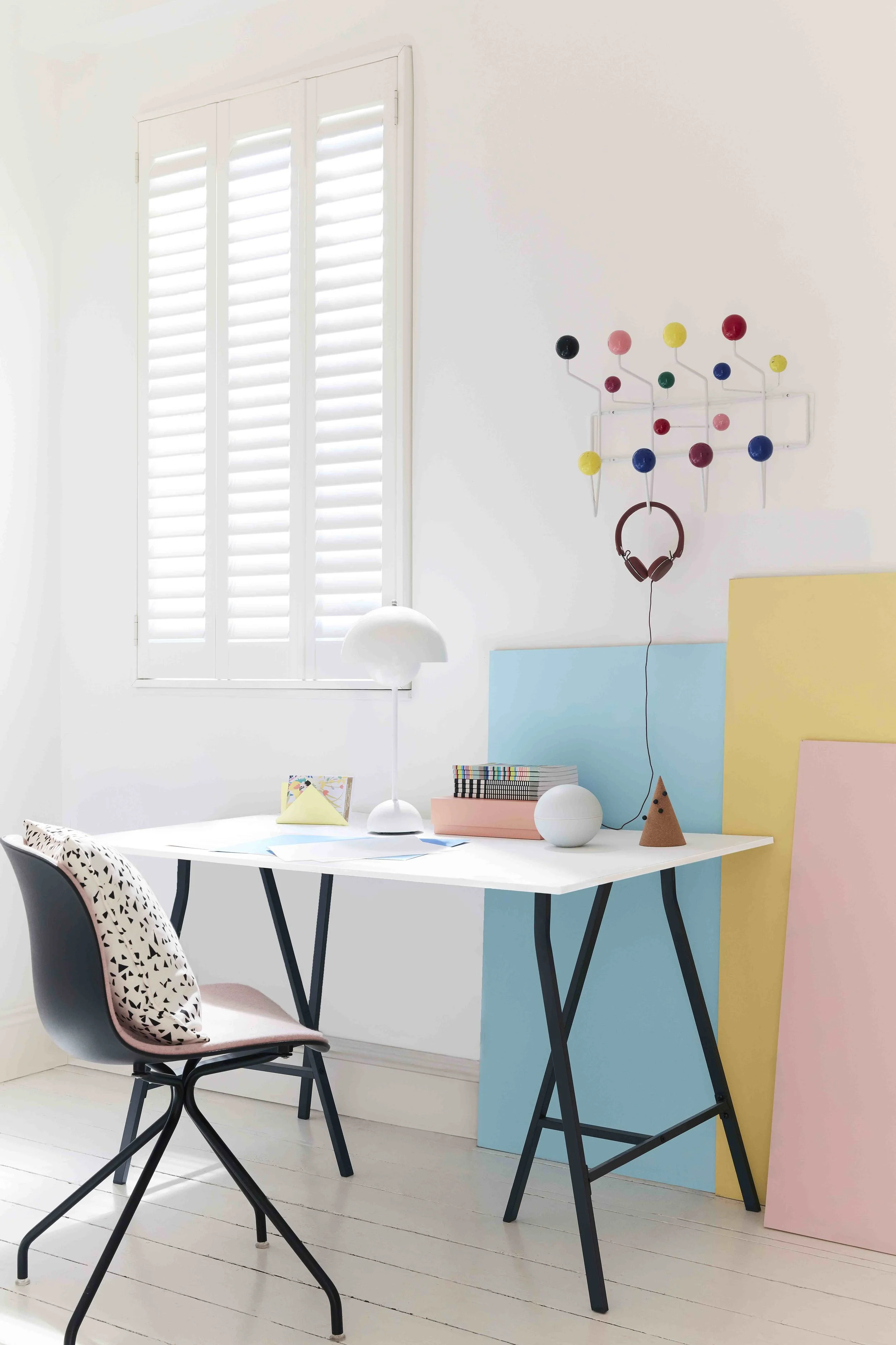 I love how the clean simplicity of these plantation shutters work with the room and do not distract from the overall interior scheme.