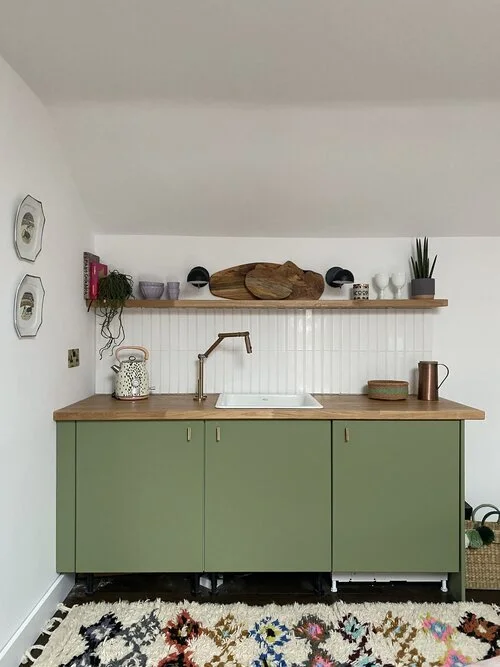 Lisa Dawson painted the kitchenette units in the self-contained annexe on the side of her house this stunning Canopy Green by Sanderson Paint.