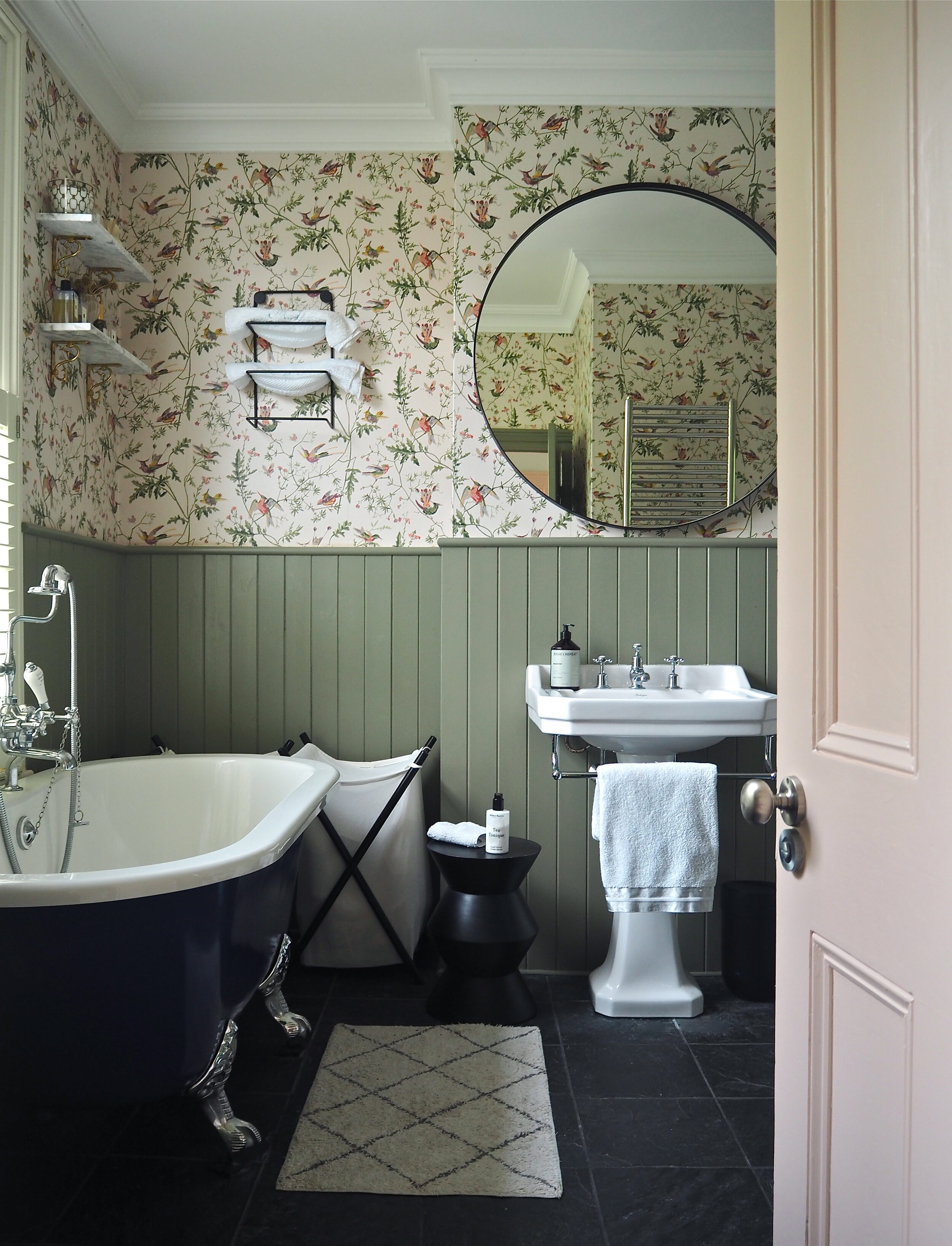 My wallpapered bathroom at home papered in ‘Hummingbirds’ wallpaper by Cole &amp; Son. I’m happy to report it is still holding up well 3 years down the line with no peeling!