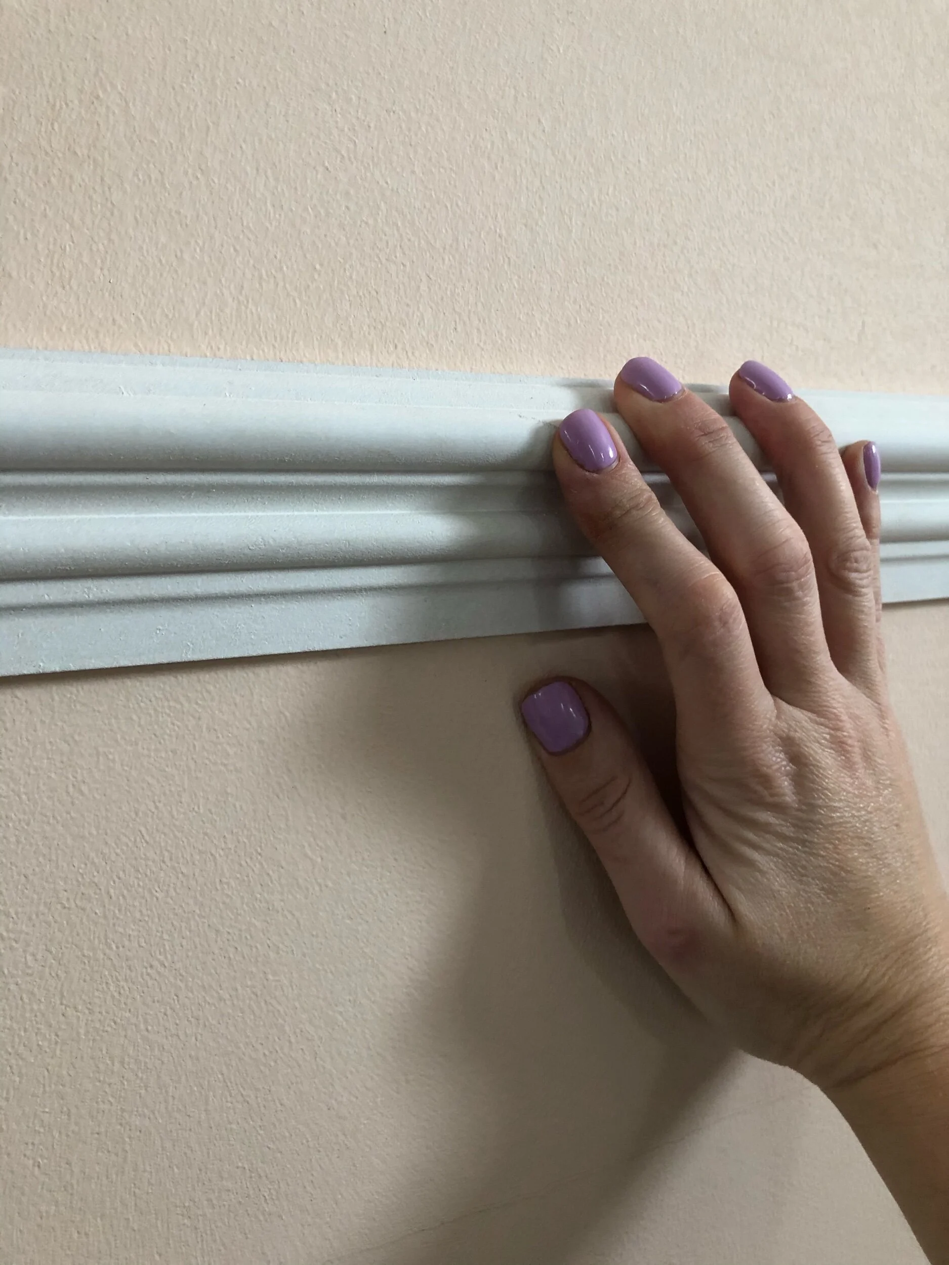 Hold your rail in place for a few minutes so the instant grab sets.