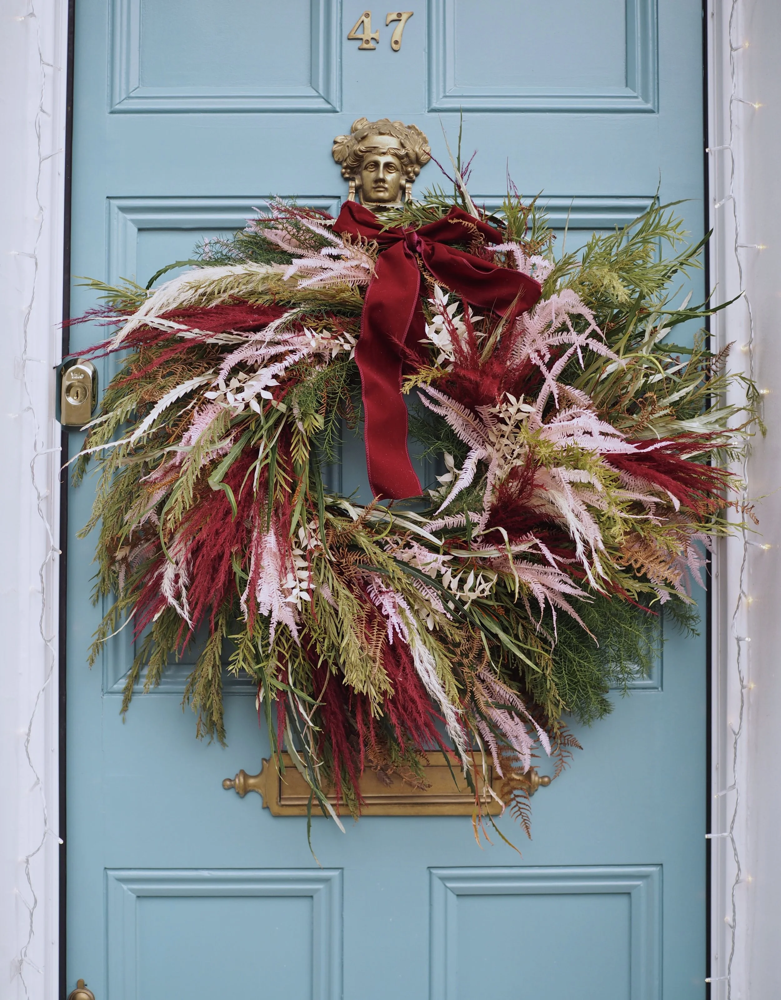 How to make a moss base Christmas door wreath