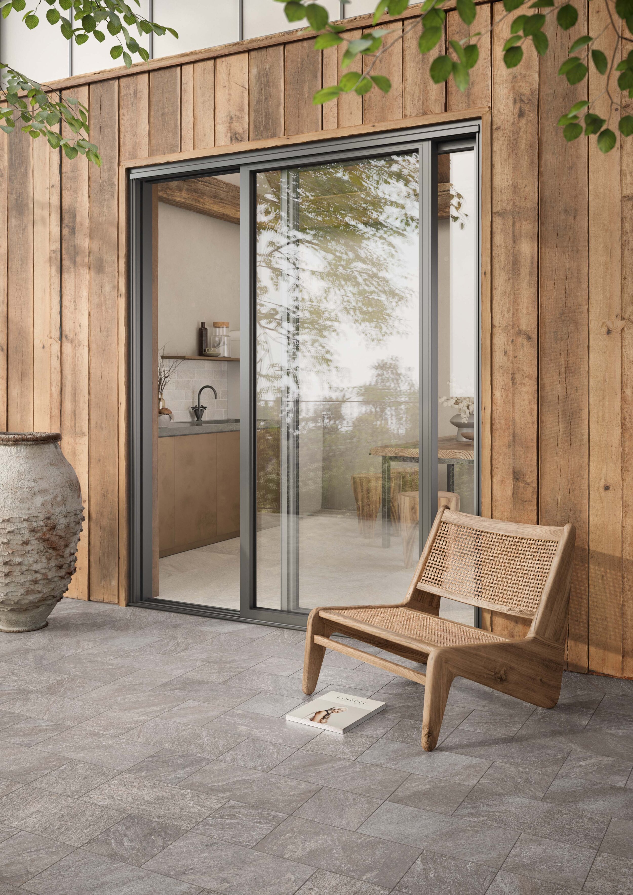 Flooring: Petra Antracite. Petra can be used both inside and outdoors - use the same tile for a look that flows, or mix to define the separate spaces.