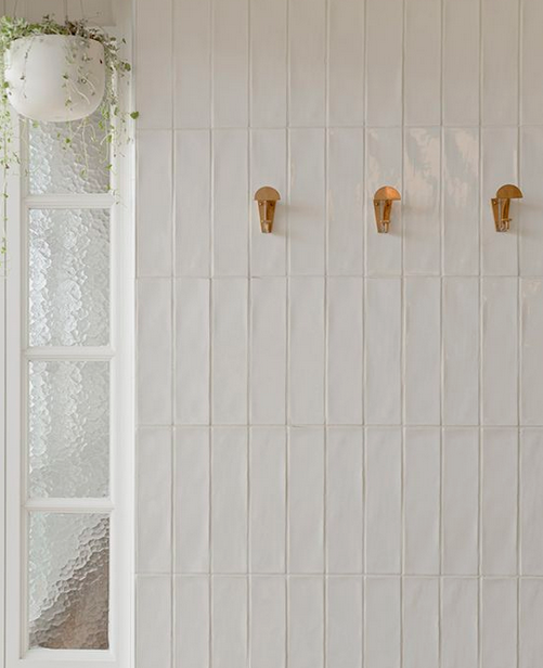 Upstanding white tiles and white grout looks fresh, clean and modern, as seen here in in the Gerrale St Kitchen by Humphrey &amp; Edwards Architects