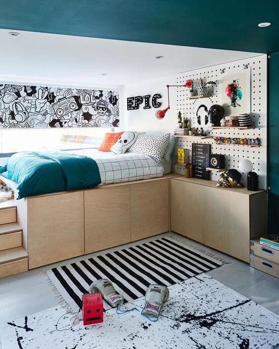 This is brilliant bedroom design that will last well into the teenage years. A fold-out desk can be found in one of the cabinets. Design &amp; photography And Then They Went Wild