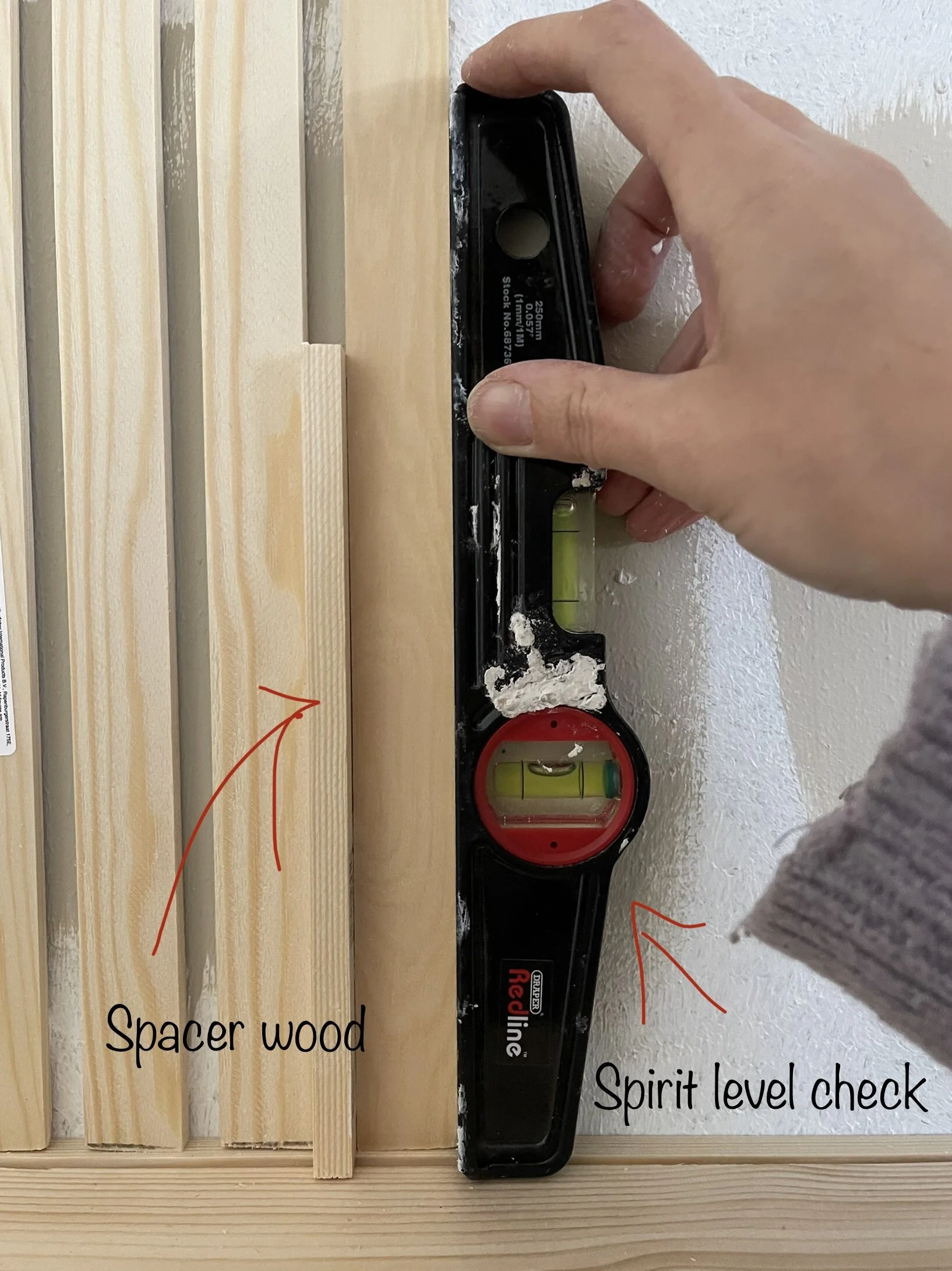 How To DIY This Decorative Wood Slat Feature Wall